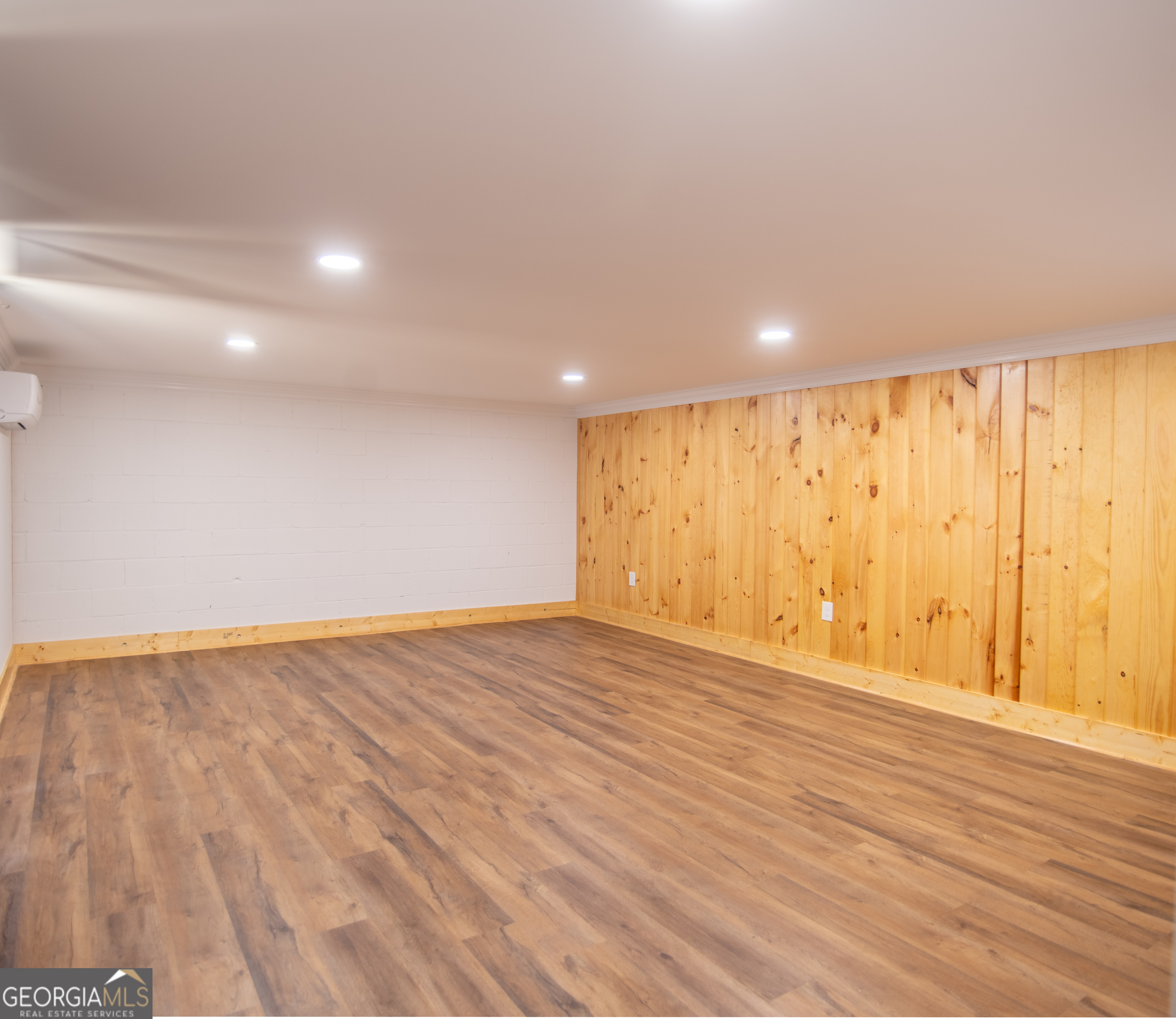 203 Teasley Lane Hartwell, GA 30643 - Photo 28 of 32 a view of an empty room with wooden floor and a window