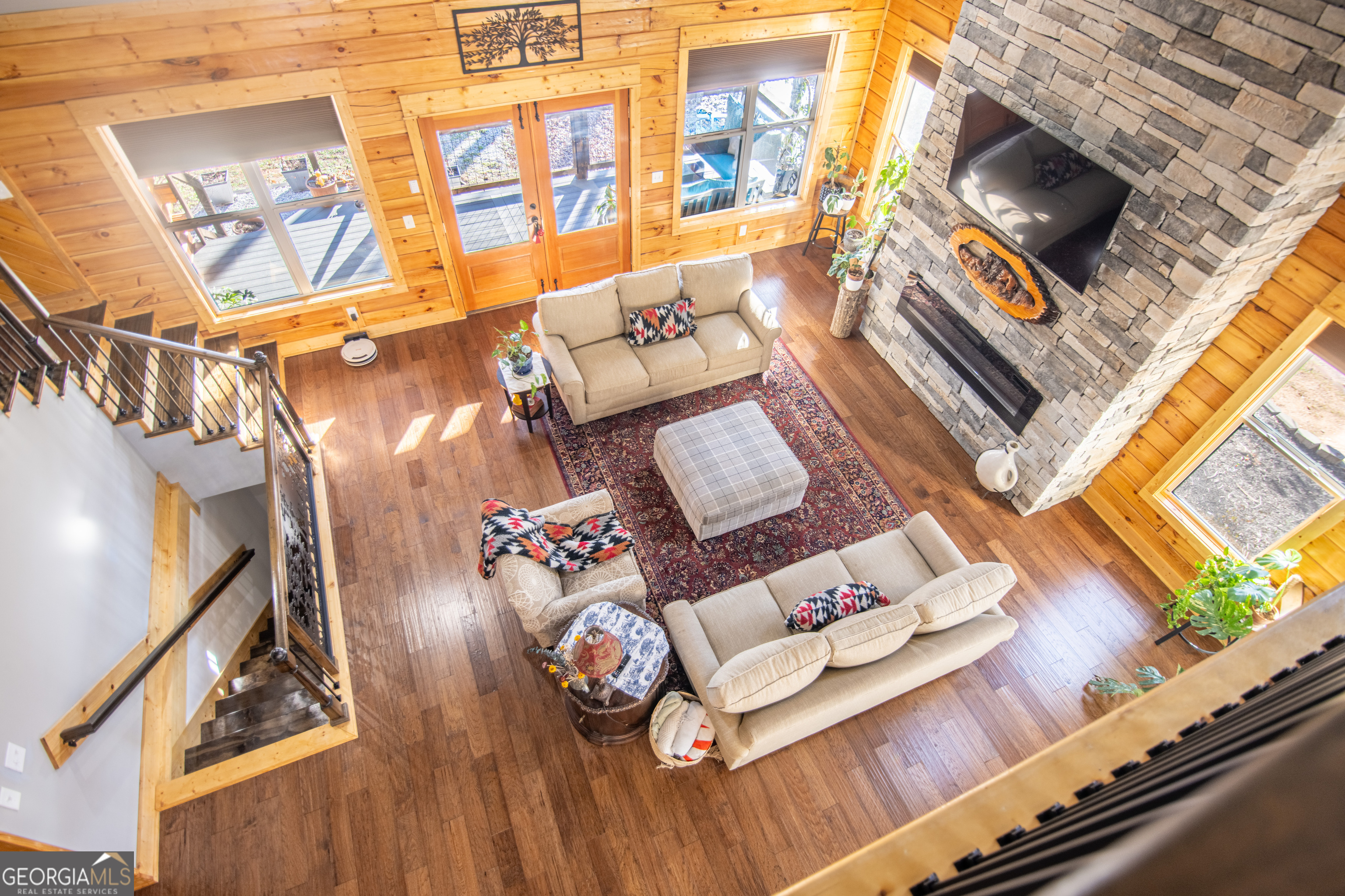 203 Teasley Lane Hartwell, GA 30643 - Photo 30 of 32 a living room with furniture and a flat screen tv