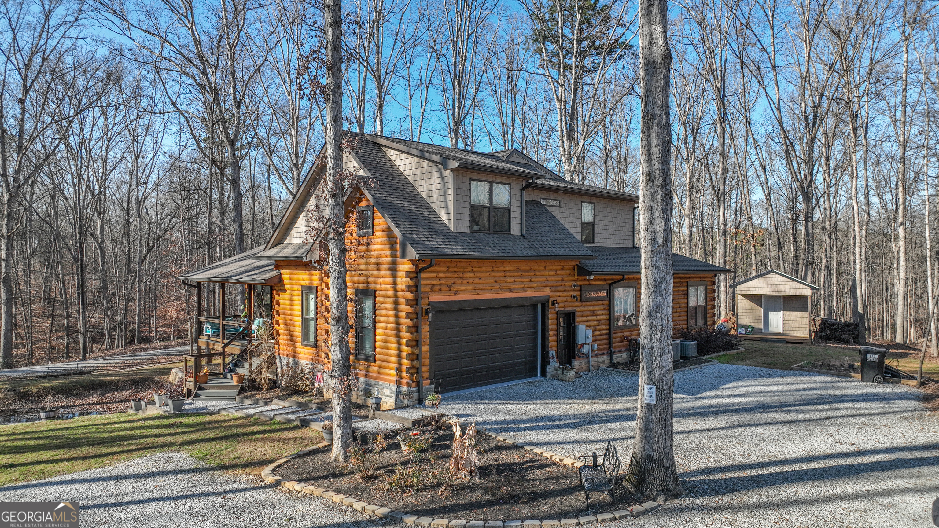 203 Teasley Lane Hartwell, GA 30643 - Photo 5 of 32 a view of a house with a small yard and large tree