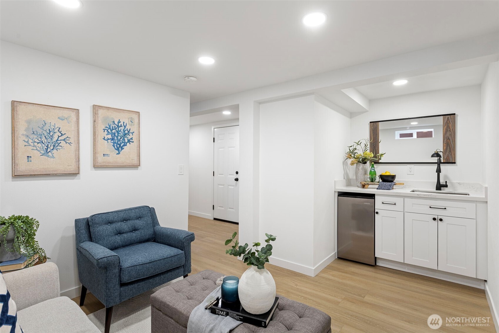 8608 16th Avenue Southwest Seattle, WA 98106 - Photo 19 of 26 a living room with furniture a couch and a potted plant