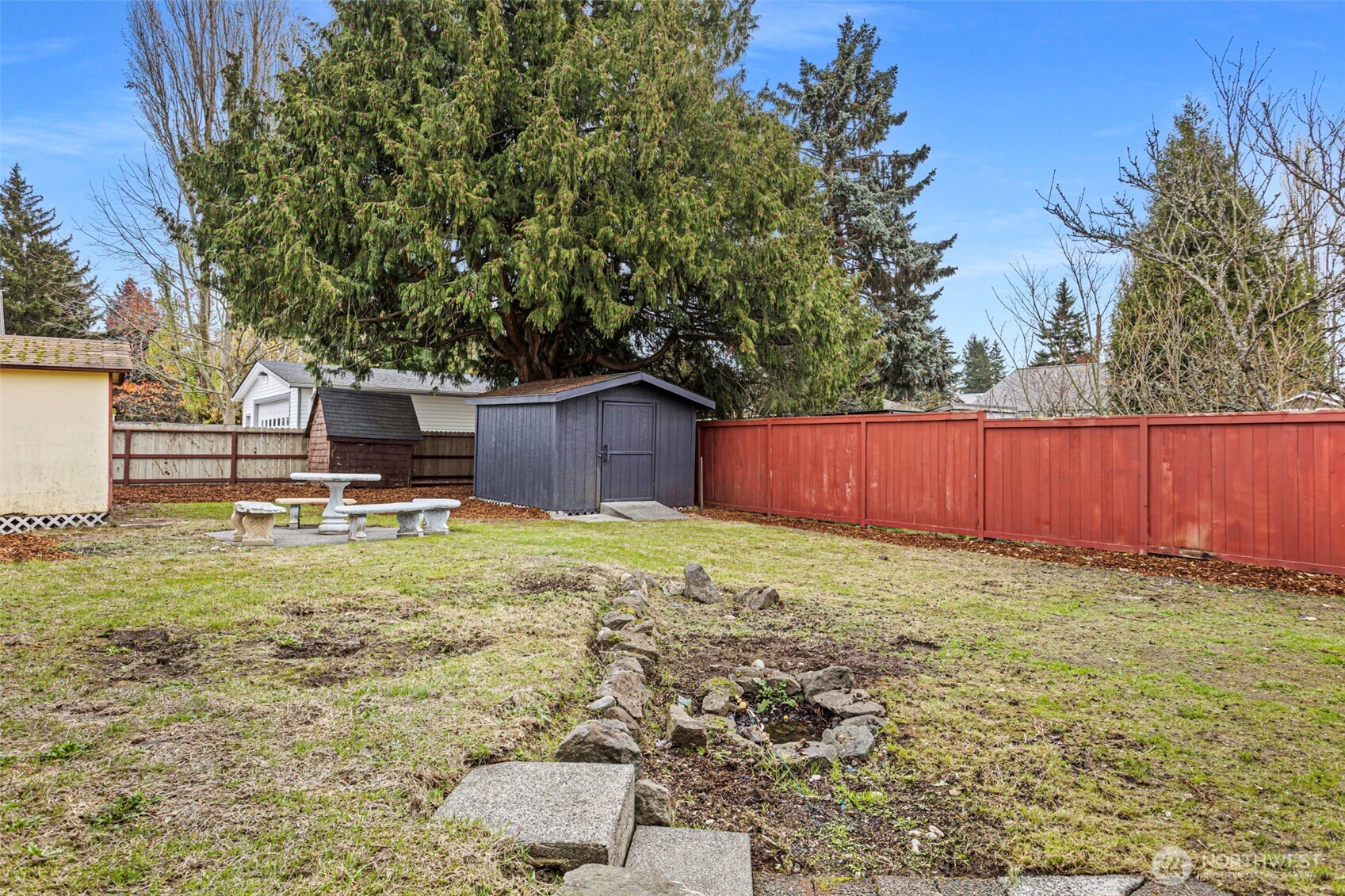 8608 16th Avenue Southwest Seattle, WA 98106 - Photo 25 of 26 a yard with wooden fence