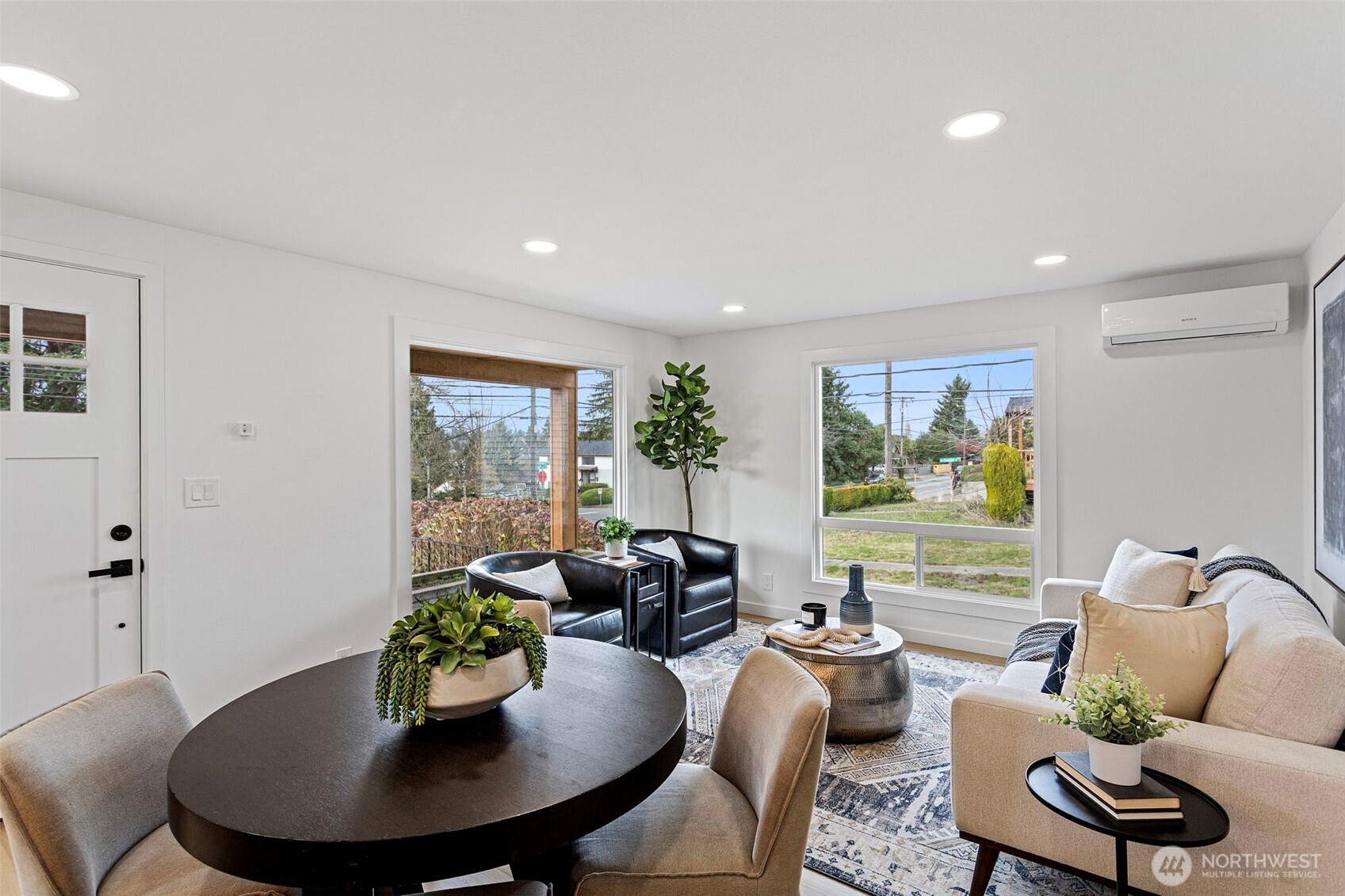 8608 16th Avenue Southwest Seattle, WA 98106 - Photo 3 of 26 a living room with furniture potted plant and a table