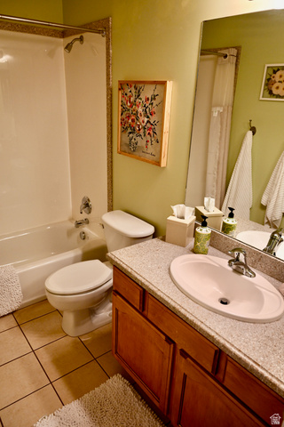 314 Brown Farm Lane Draper, UT 84020 - Photo 22 of 57 Bathroom featuring a single vanity with wood-finish cabinetry, a light-colored countertop, and an integrated oval sink