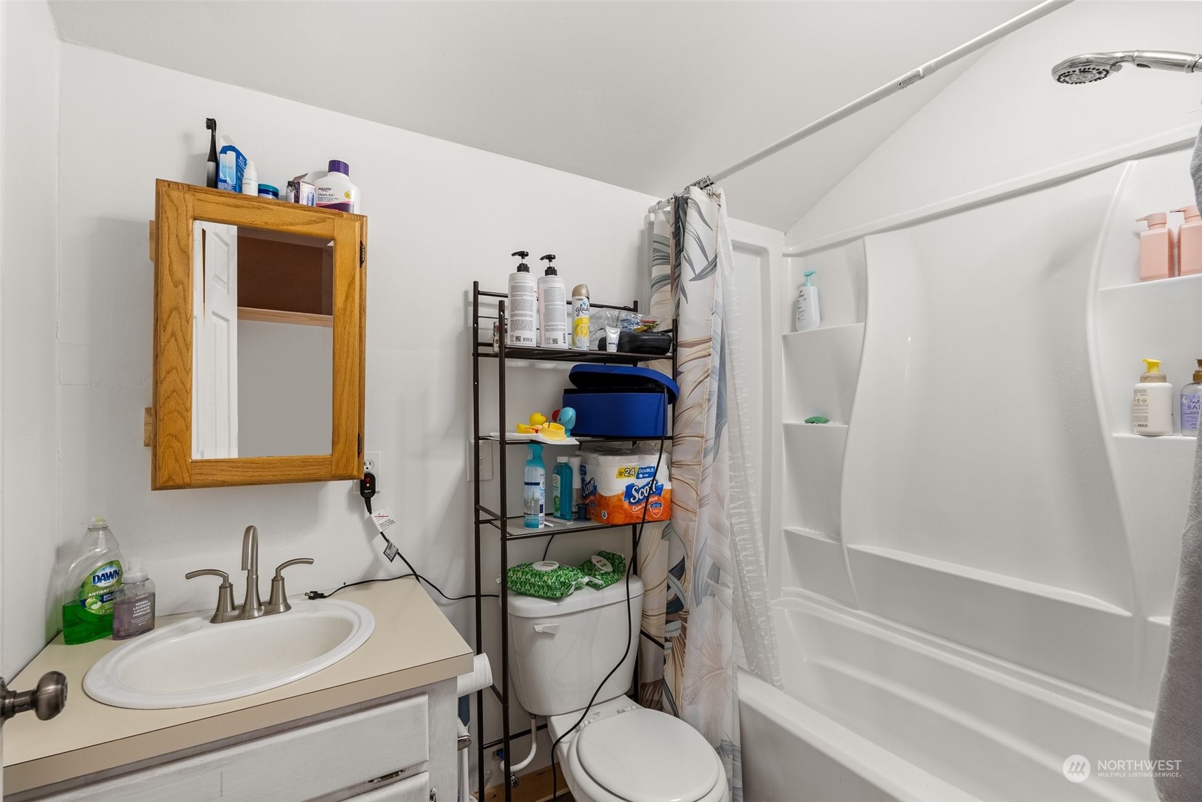 9847 Lundeen Road Southwest Rochester, WA 98579 - Photo 12 of 25 a bathroom with a sink toilet and shower