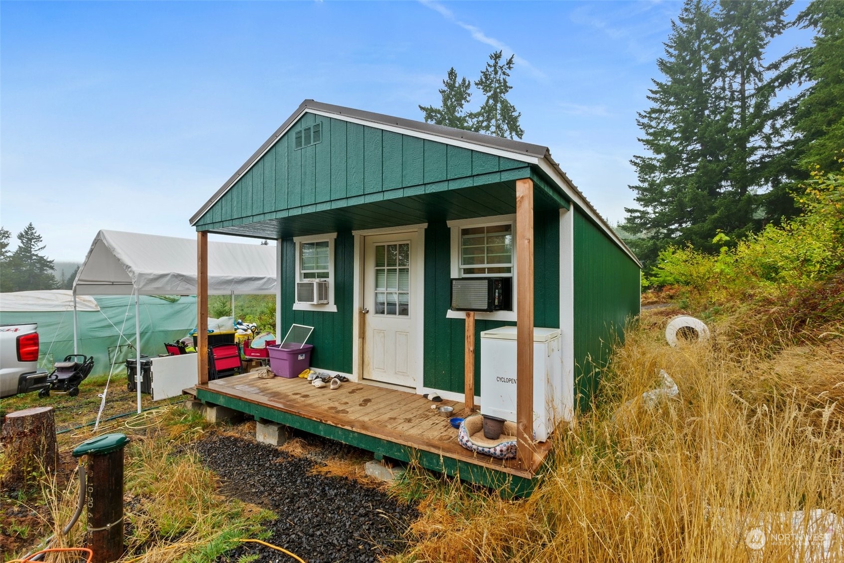 9847 Lundeen Road Southwest Rochester, WA 98579 - Photo 3 of 25 a front view of house with yard