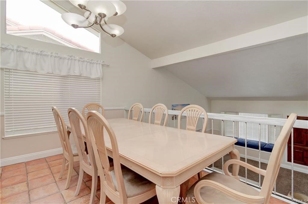 25095 Perch Drive Dana Point, CA 92629 - Photo 8 of 30 a view of a dining room with furniture and chandelier