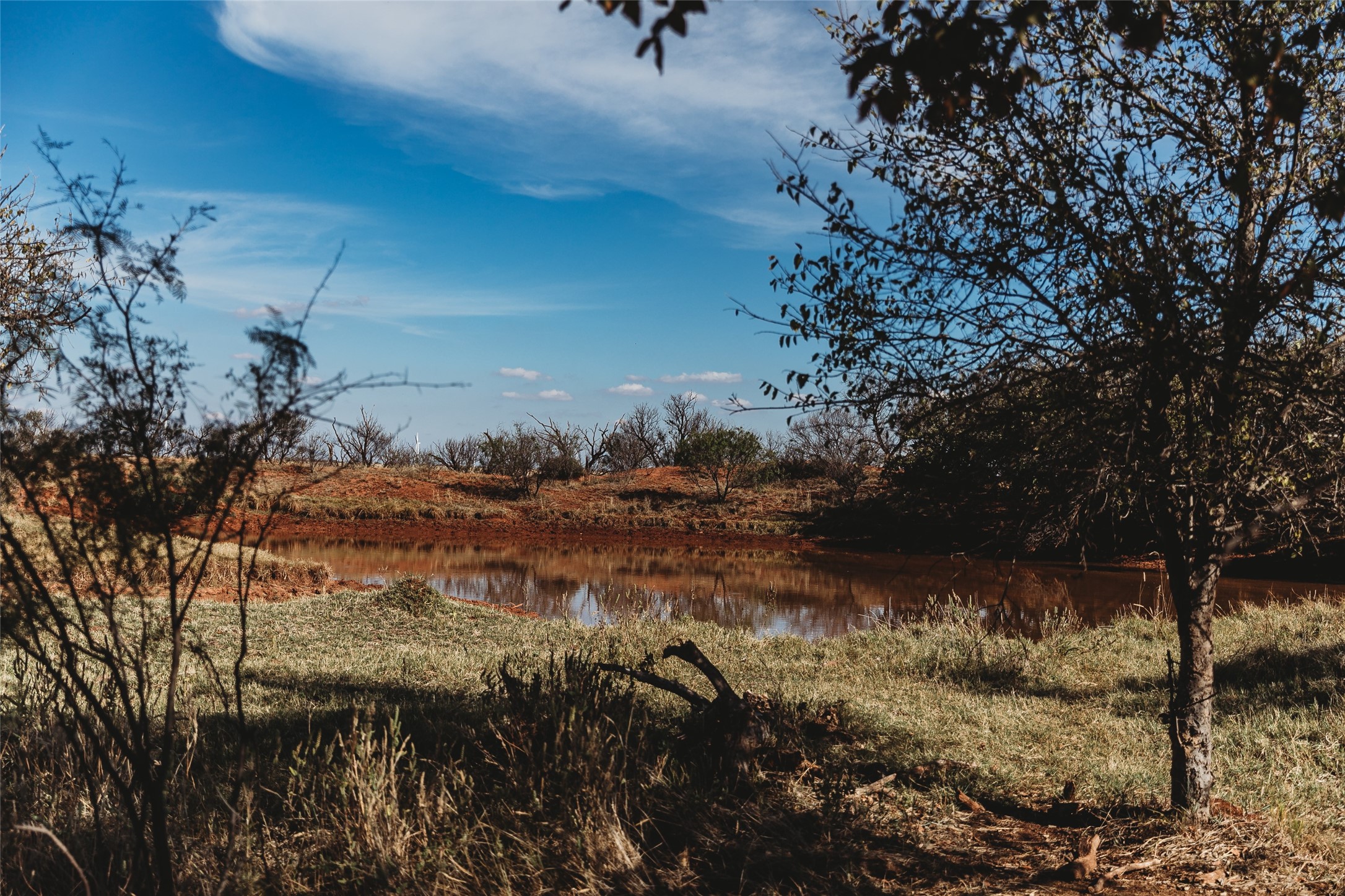 Tbd Marr Road Haskell, TX 79521 - Photo 9 of 25 a view of a lake in between two trees