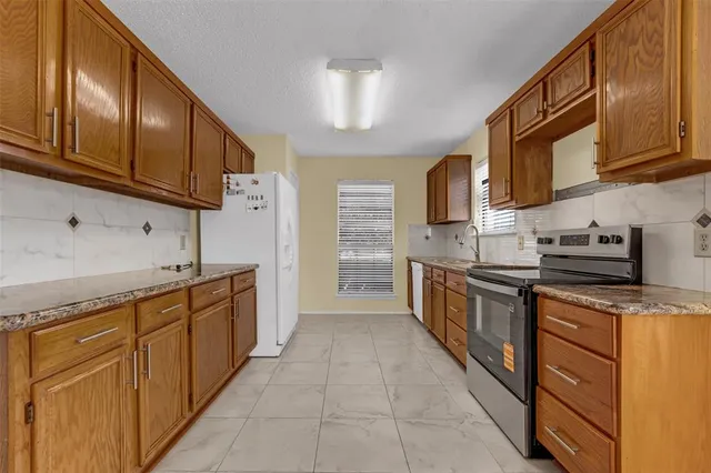 $345,000 | 5121 Wood Creek Lane, Garland, TX 75044