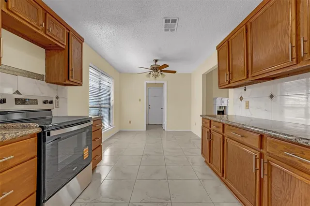 $345,000 | 5121 Wood Creek Lane, Garland, TX 75044