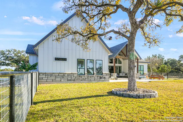 a view of a house with swimming pool