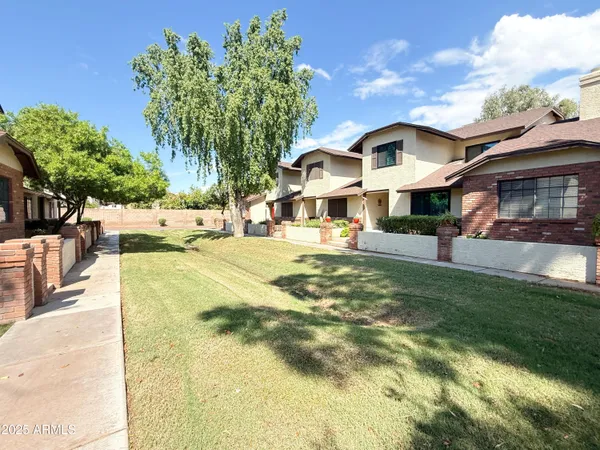 a view of a house with a swimming pool