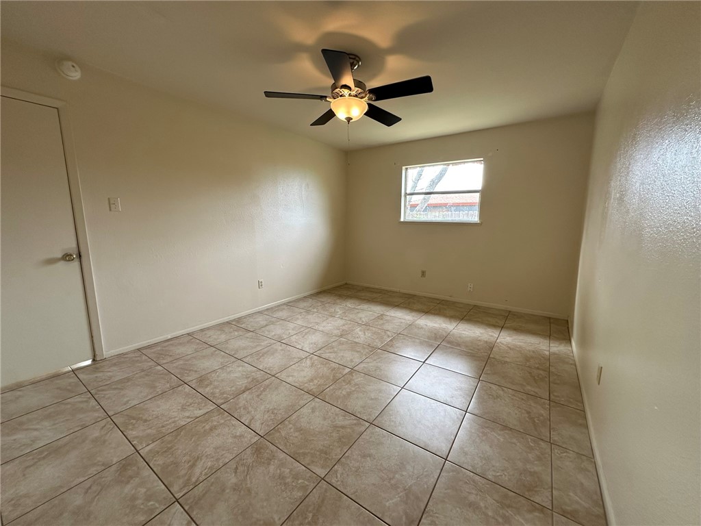 2123 Zephyr Circle Ingleside, TX 78362 - Photo 19 of 29 a view of an empty room with a window