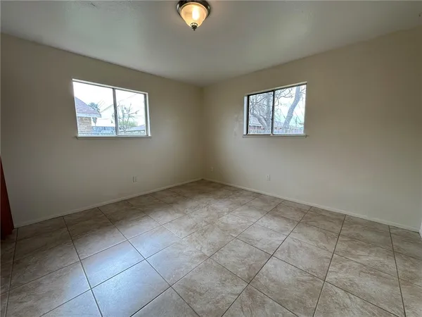 an empty room with windows