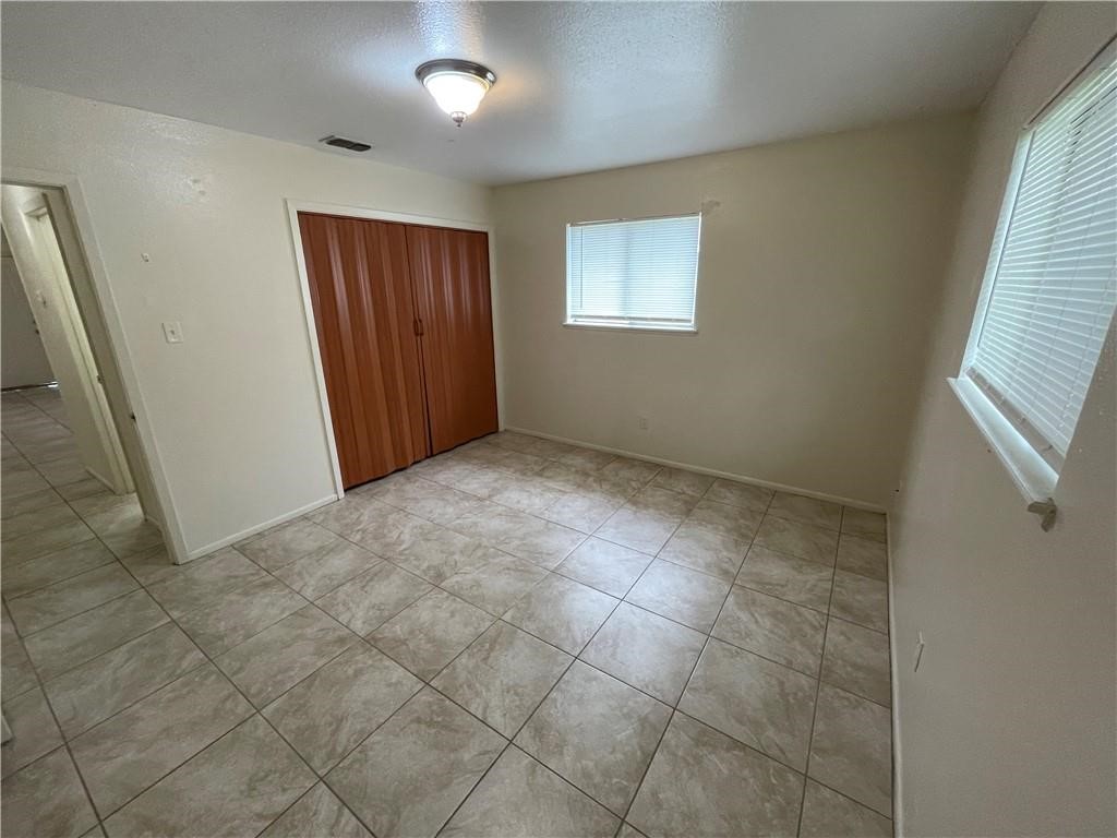 2123 Zephyr Circle Ingleside, TX 78362 - Photo 22 of 29 an empty room with windows