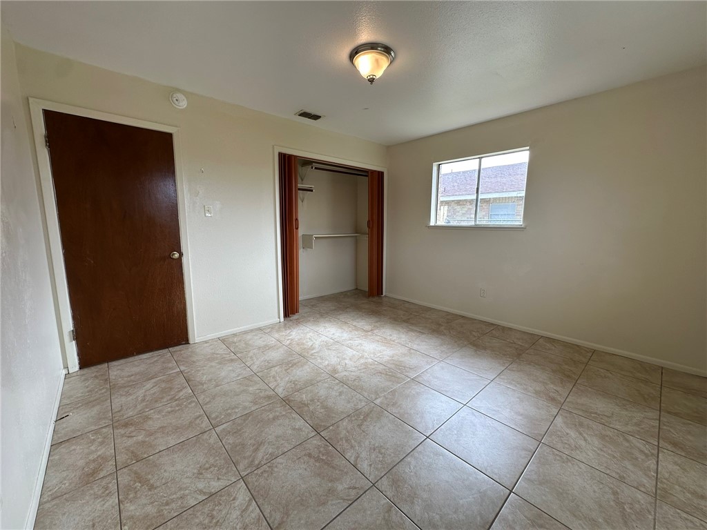 2123 Zephyr Circle Ingleside, TX 78362 - Photo 25 of 29 a view of an empty room with a window