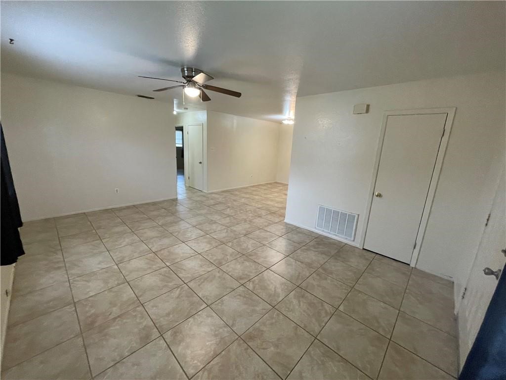 2123 Zephyr Circle Ingleside, TX 78362 - Photo 4 of 29 an empty room with closet and fan