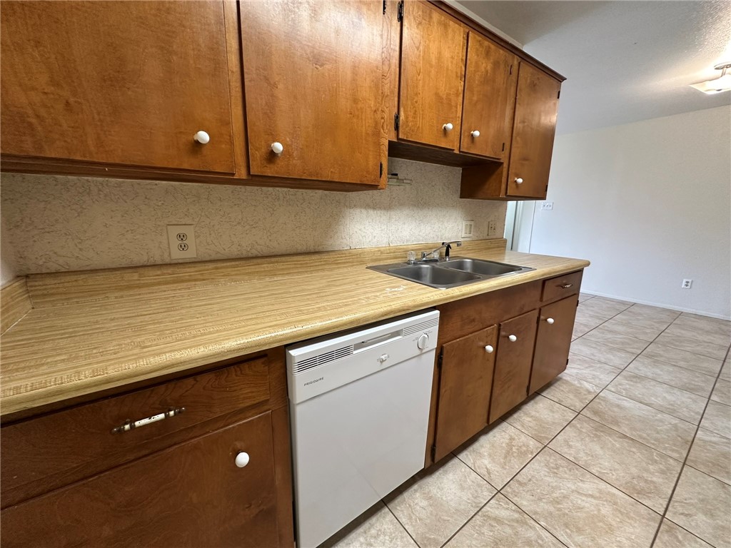 2123 Zephyr Circle Ingleside, TX 78362 - Photo 8 of 29 a kitchen with a sink and cabinets