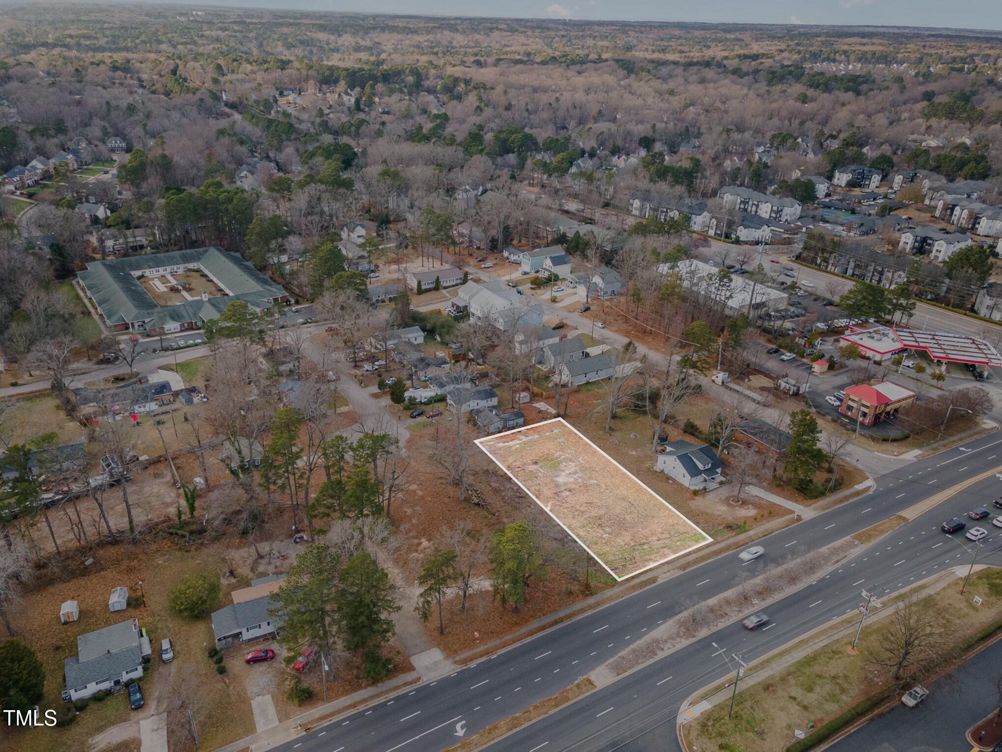 6217 Creedmoor Road Raleigh, NC 27612 - Photo 6 of 7 an aerial view of house with yard