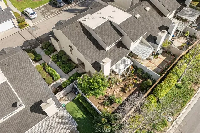 an aerial view of residential house with outdoor space