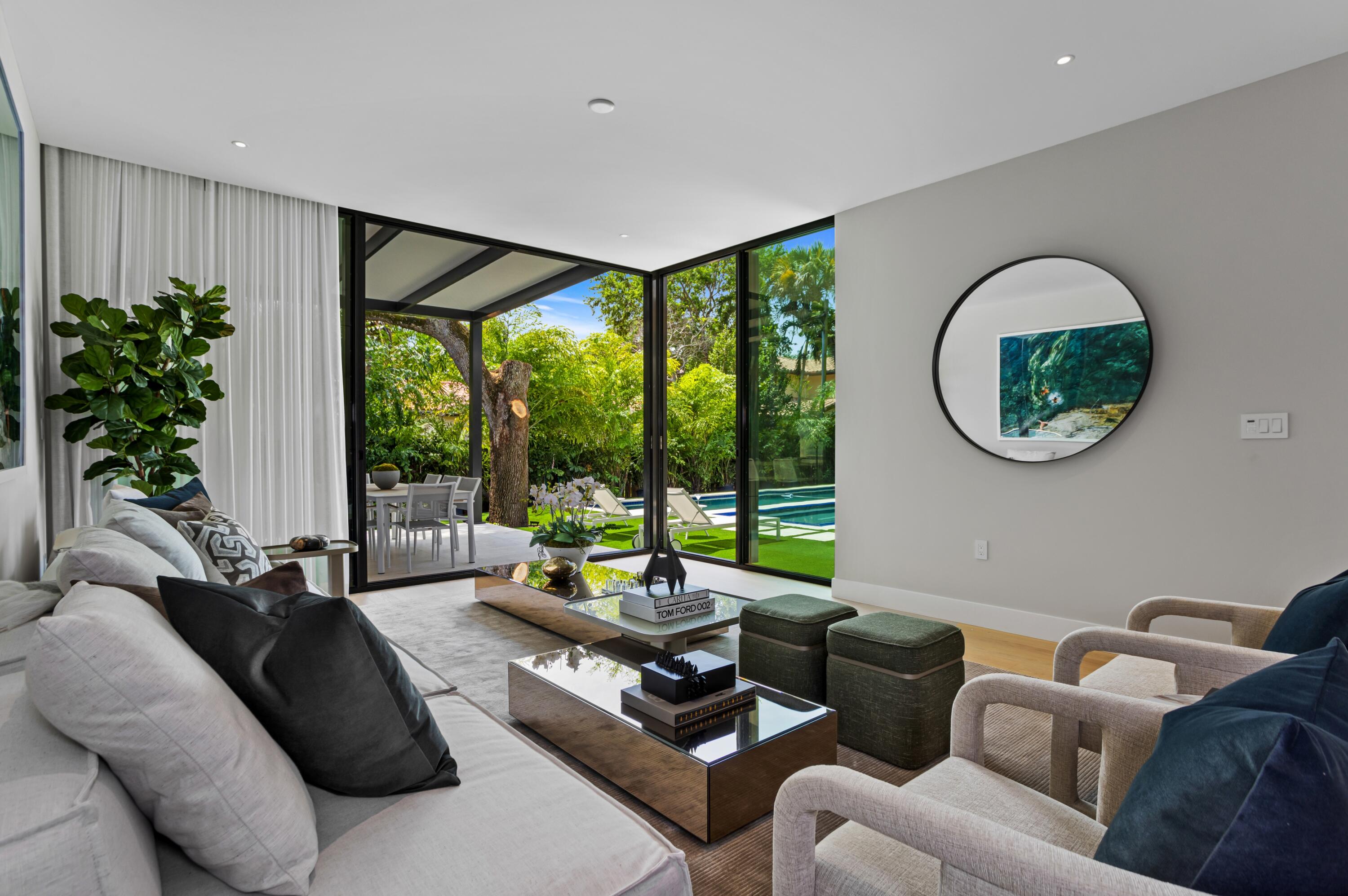 754 Oleander Street Boca Raton, FL 33486 - Photo 14 of 41 a living room with furniture and a large window