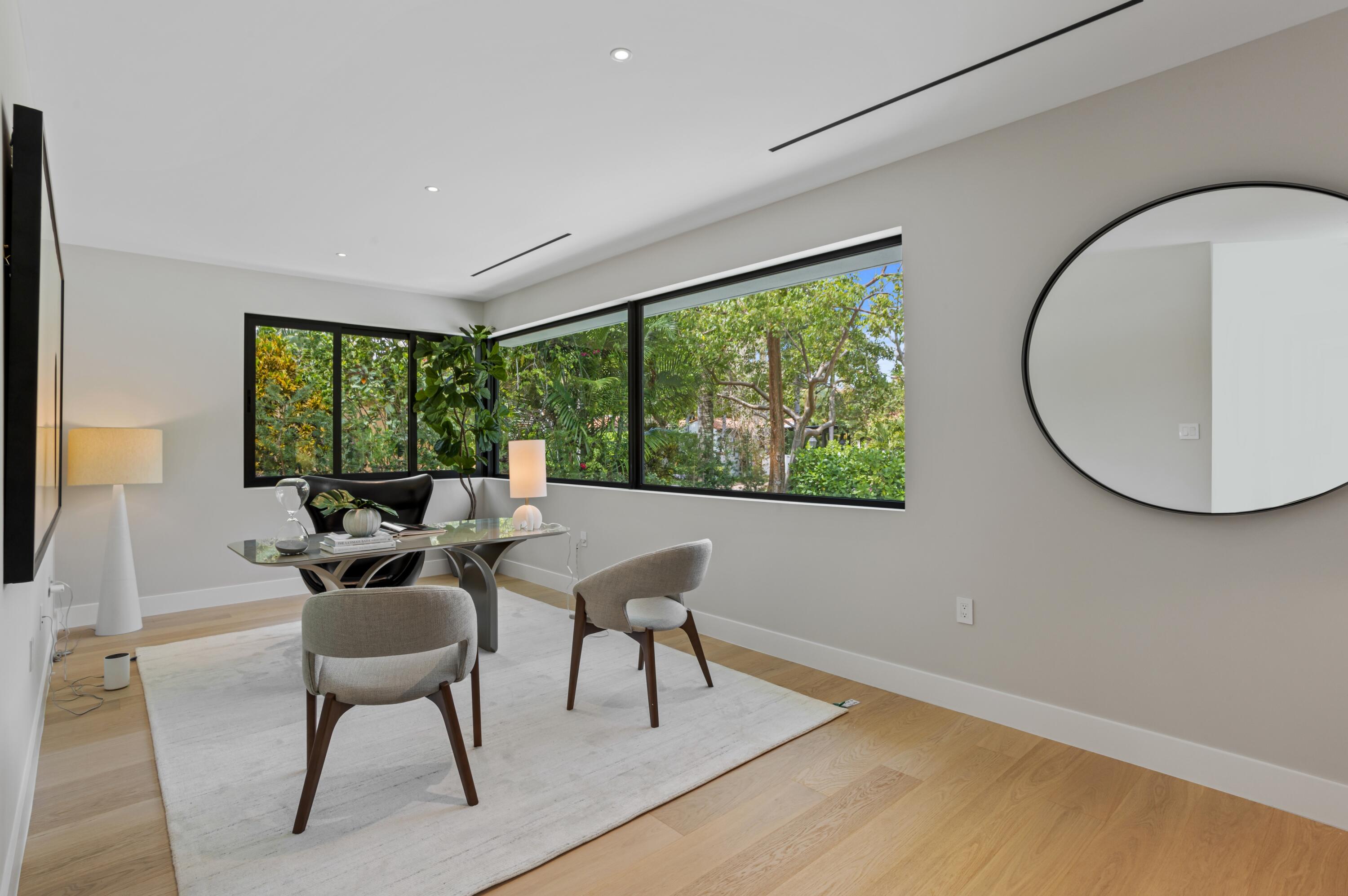 754 Oleander Street Boca Raton, FL 33486 - Photo 15 of 41 a living room with furniture and a large window