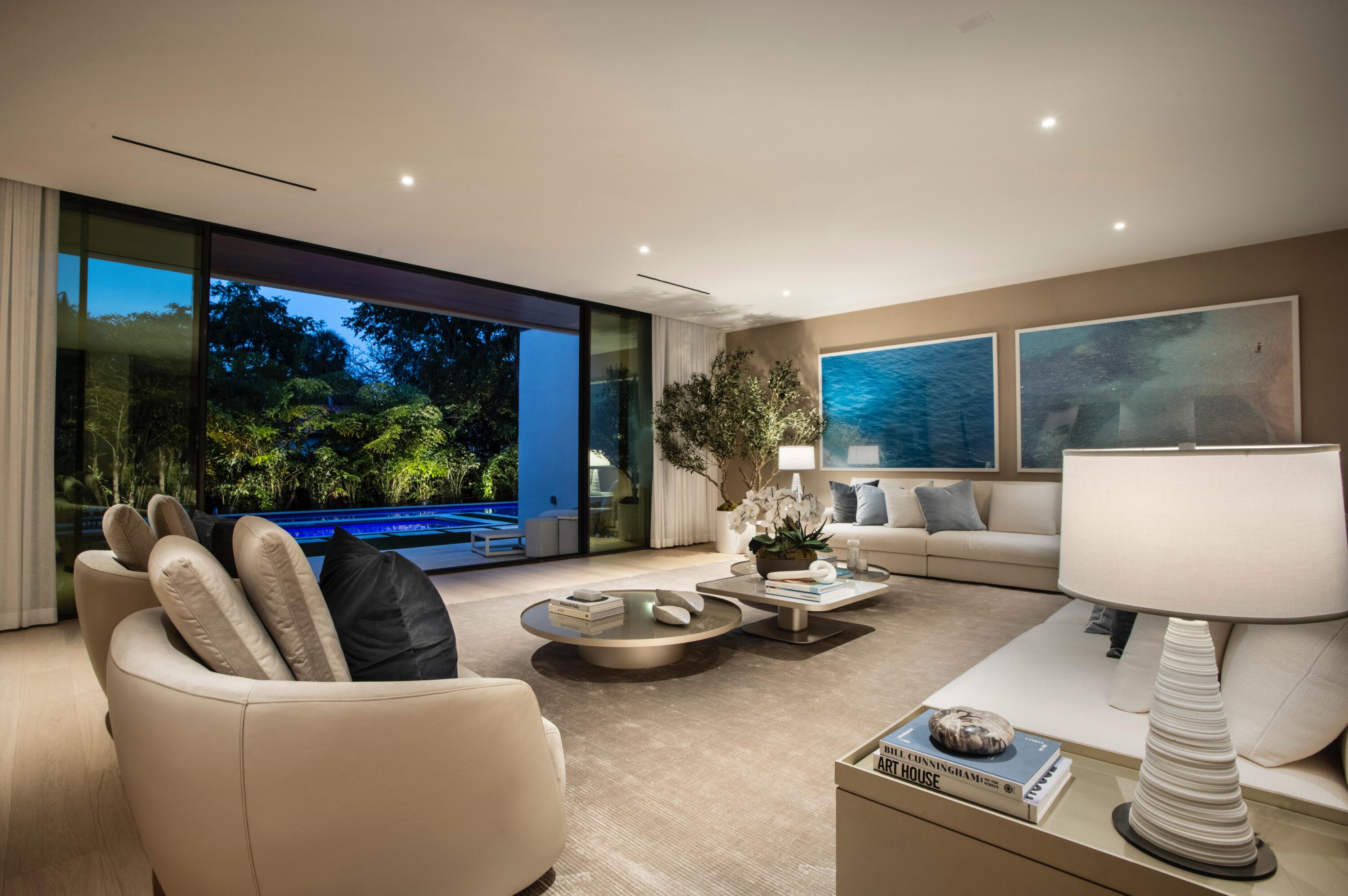 754 Oleander Street Boca Raton, FL 33486 - Photo 3 of 41 a living room with furniture and a flat screen tv
