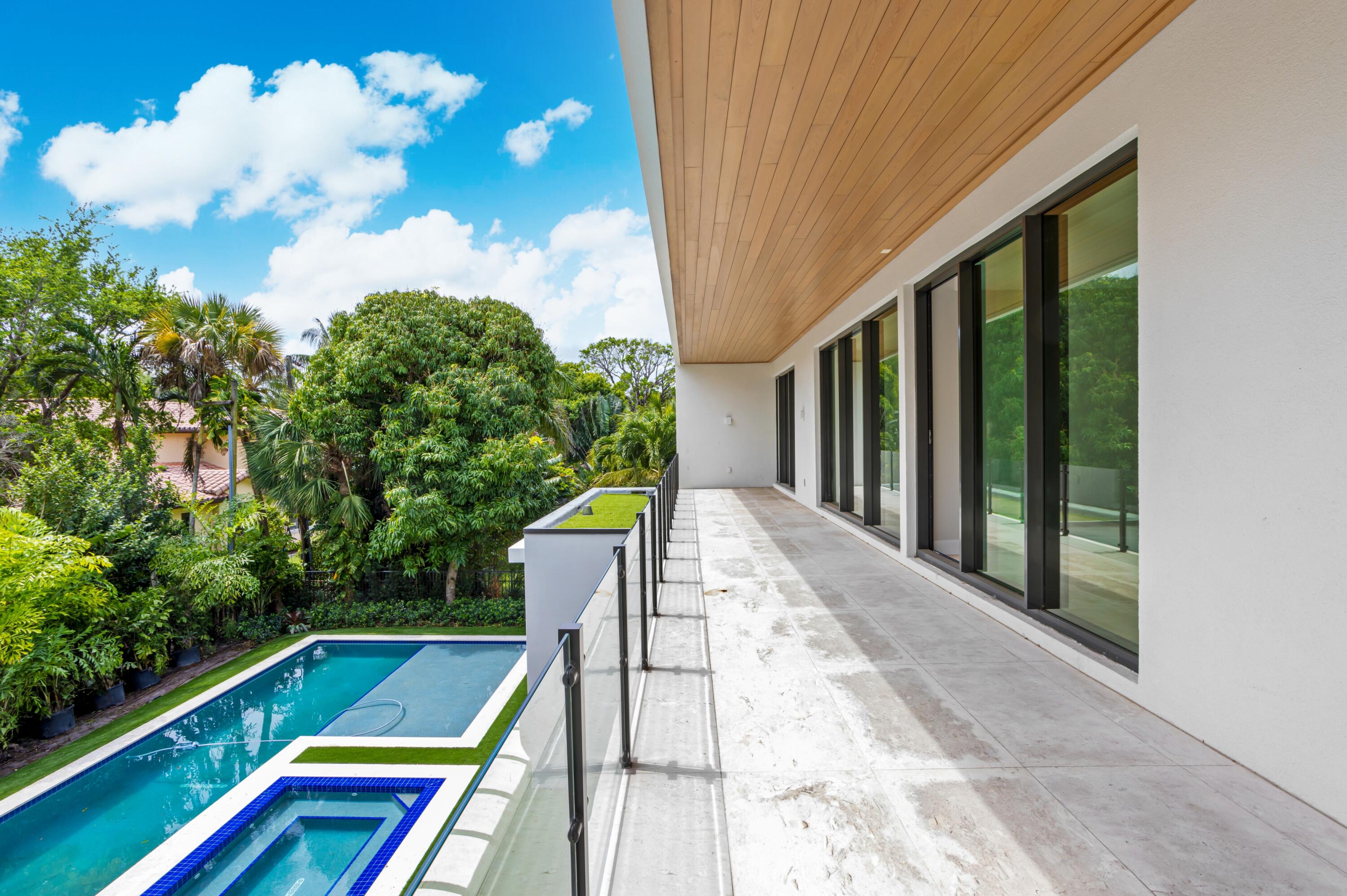 754 Oleander Street Boca Raton, FL 33486 - Photo 33 of 41 a view of swimming pool with seating area