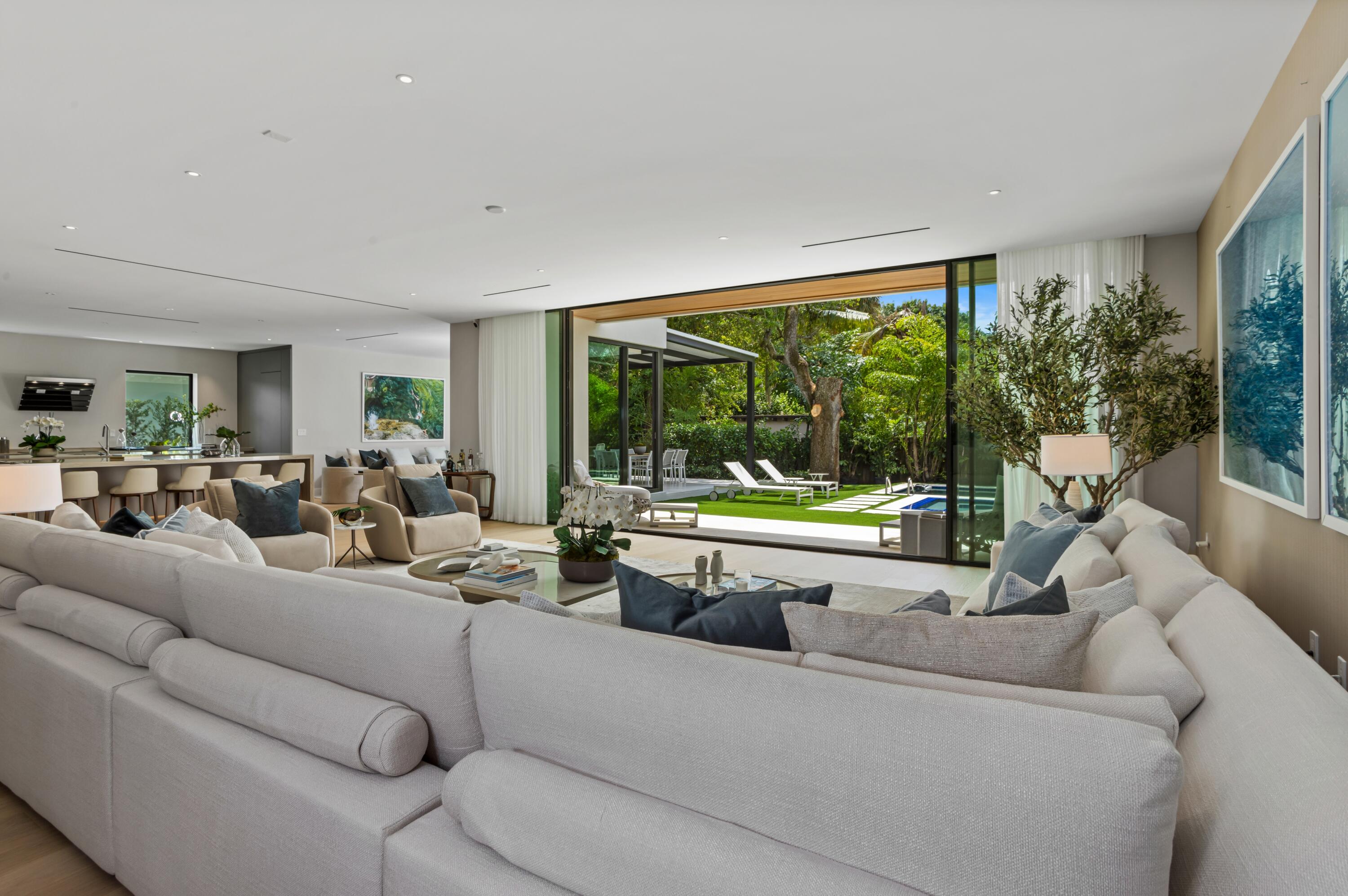 754 Oleander Street Boca Raton, FL 33486 - Photo 4 of 41 a living room with furniture and a large window