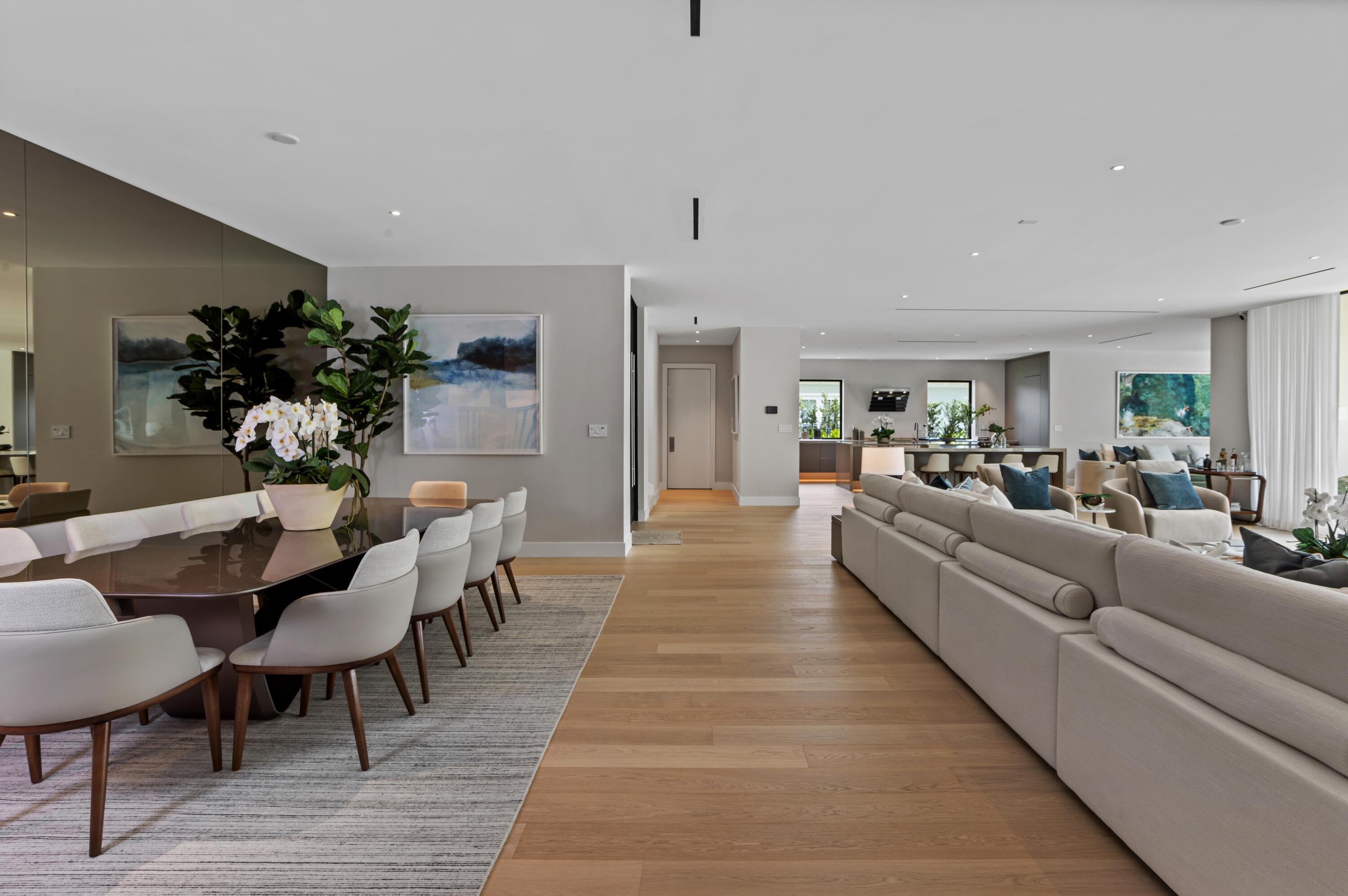 754 Oleander Street Boca Raton, FL 33486 - Photo 7 of 41 a living room with furniture wooden floor and a chandelier