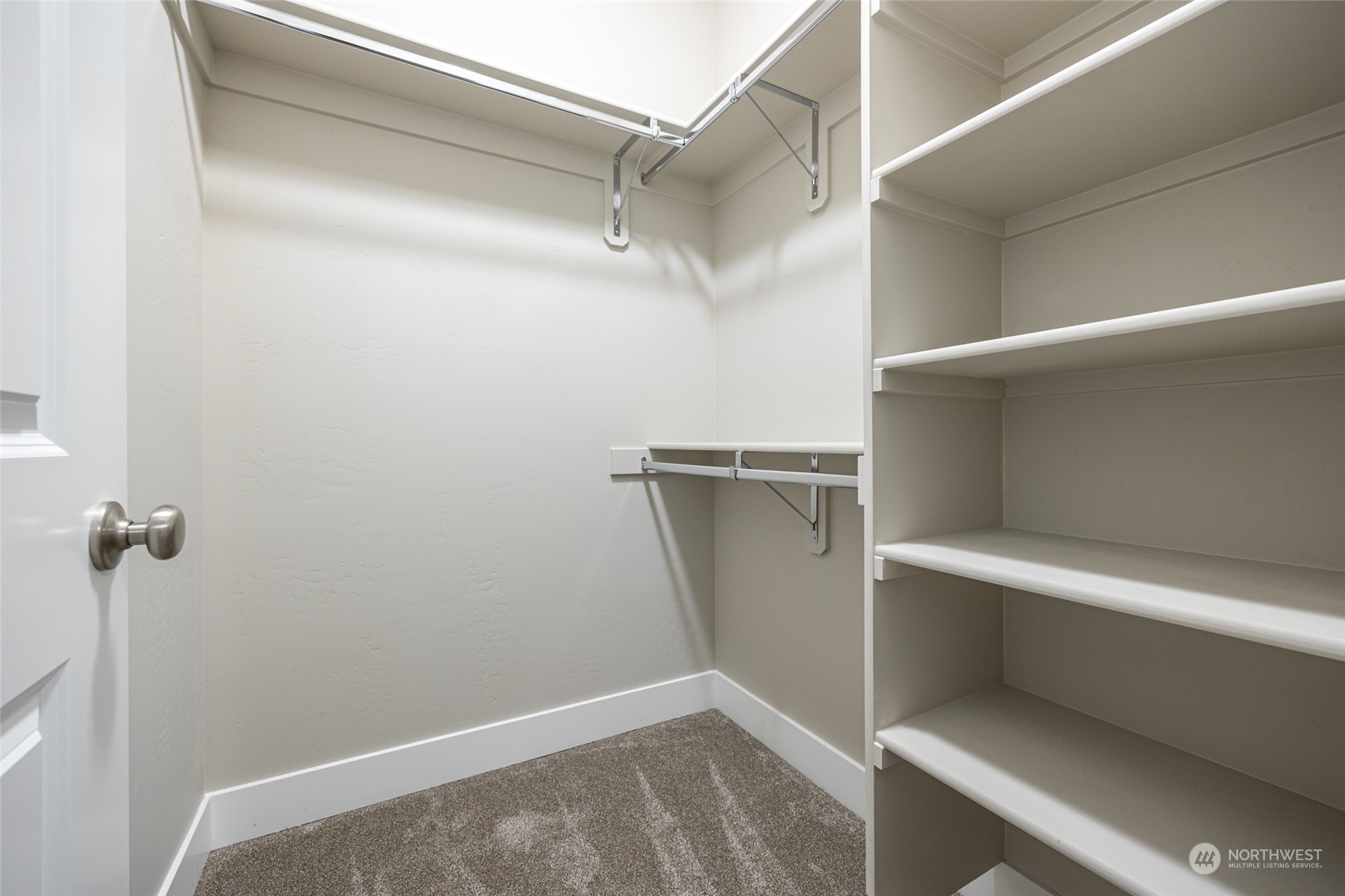 5307 South Kent Street Kennewick, WA 99337 - Photo 11 of 40 a view of walk in closet with empty racks