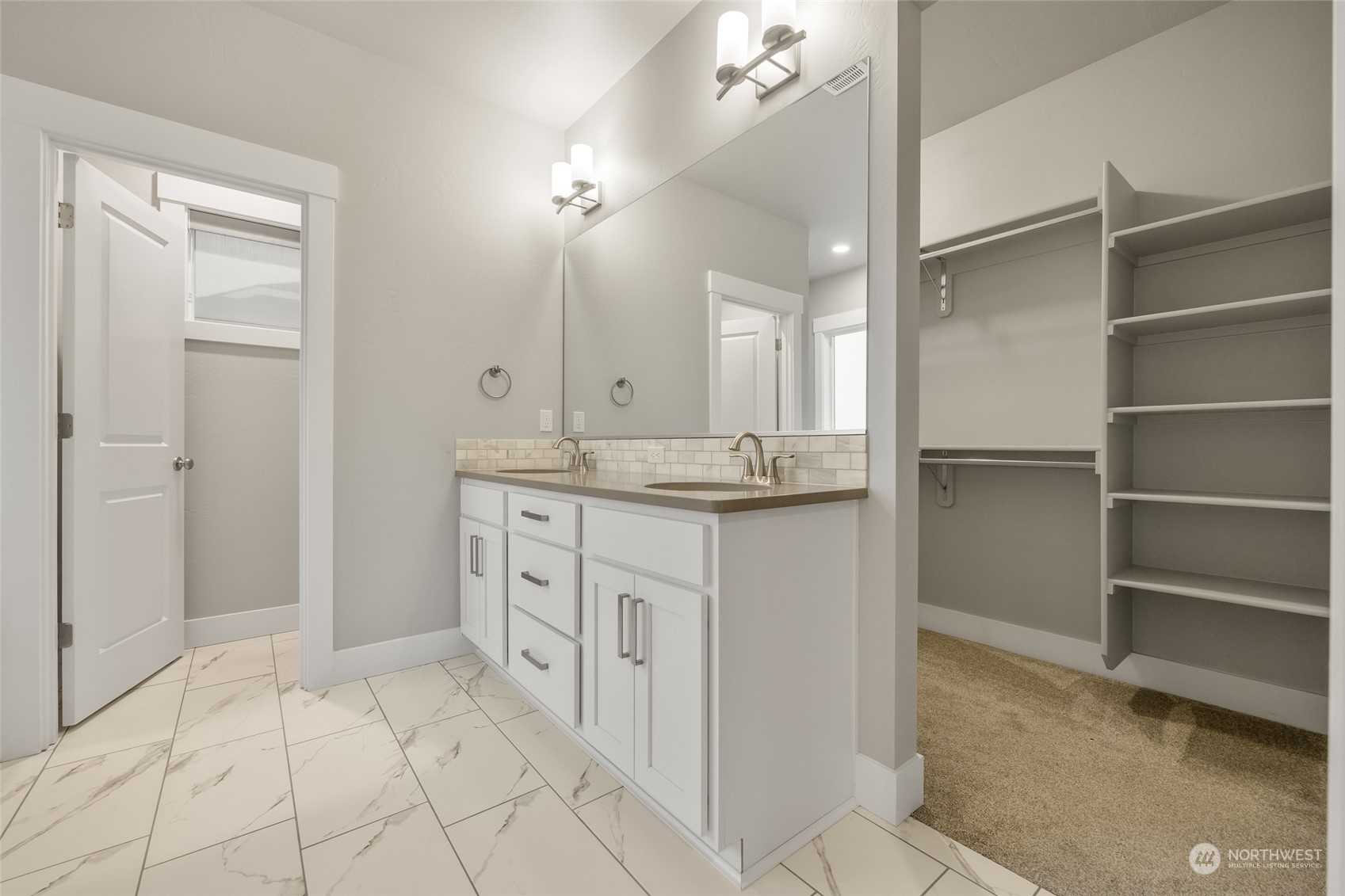 5307 South Kent Street Kennewick, WA 99337 - Photo 15 of 40 a bathroom with a sink vanity and a mirror