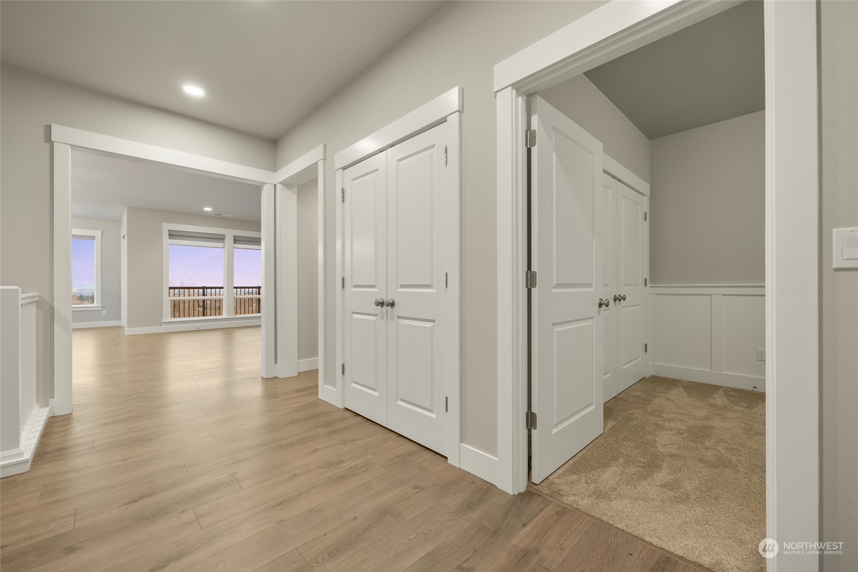 5307 South Kent Street Kennewick, WA 99337 - Photo 5 of 40 a view of a hallway with wooden floor