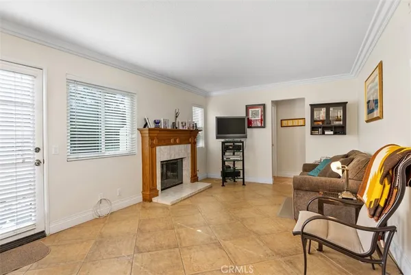 a view of a livingroom with furniture and a fireplace