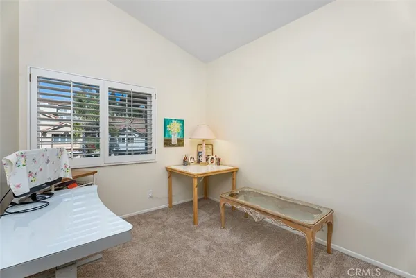 a room with furniture and window