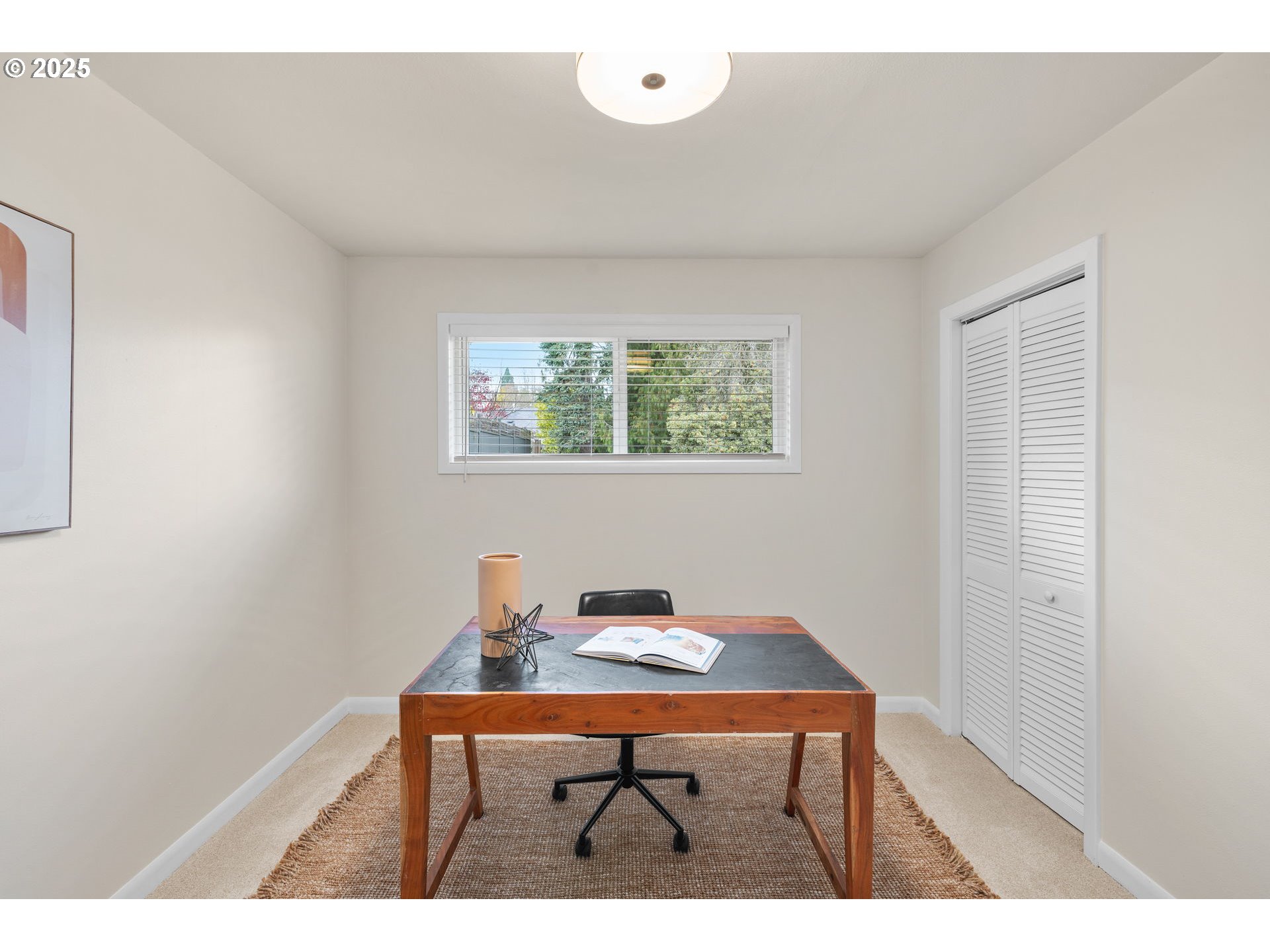 7643 Southeast Market Street Portland, OR 97215 - Photo 13 of 34 a room with furniture and window