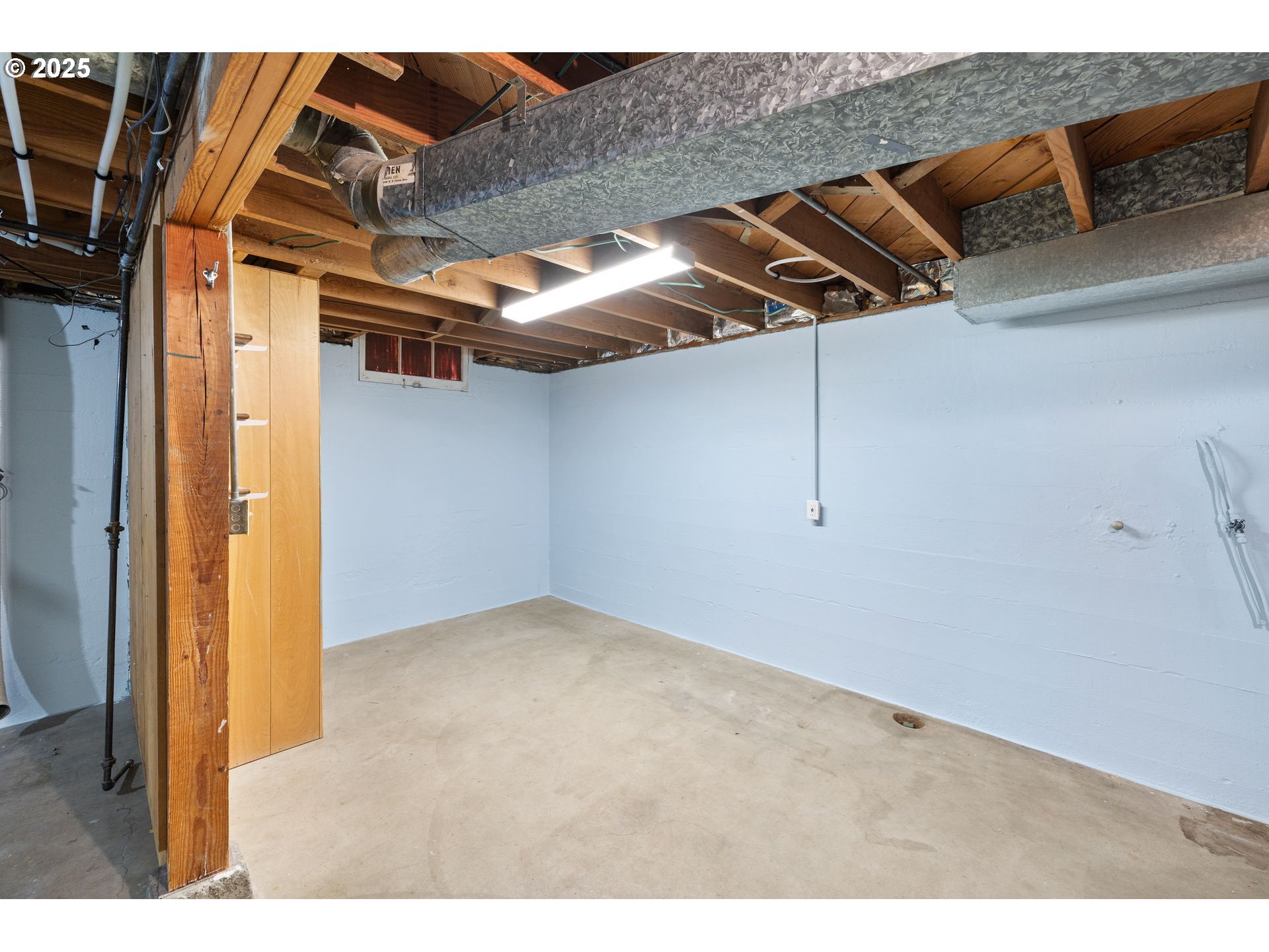 7643 Southeast Market Street Portland, OR 97215 - Photo 21 of 34 a view of utility room
