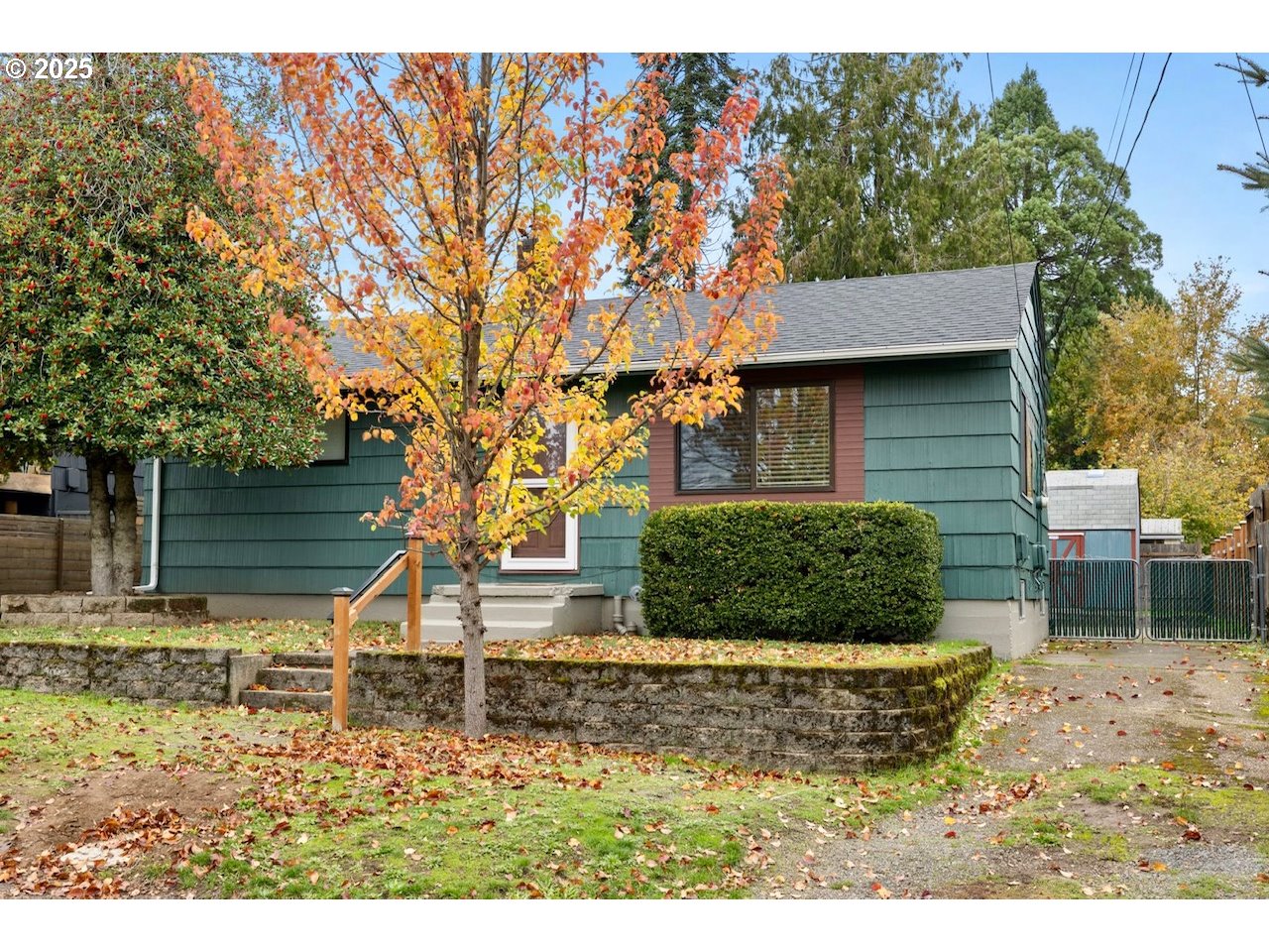 7643 Southeast Market Street Portland, OR 97215 - Photo 26 of 34 front view of a house with a yard