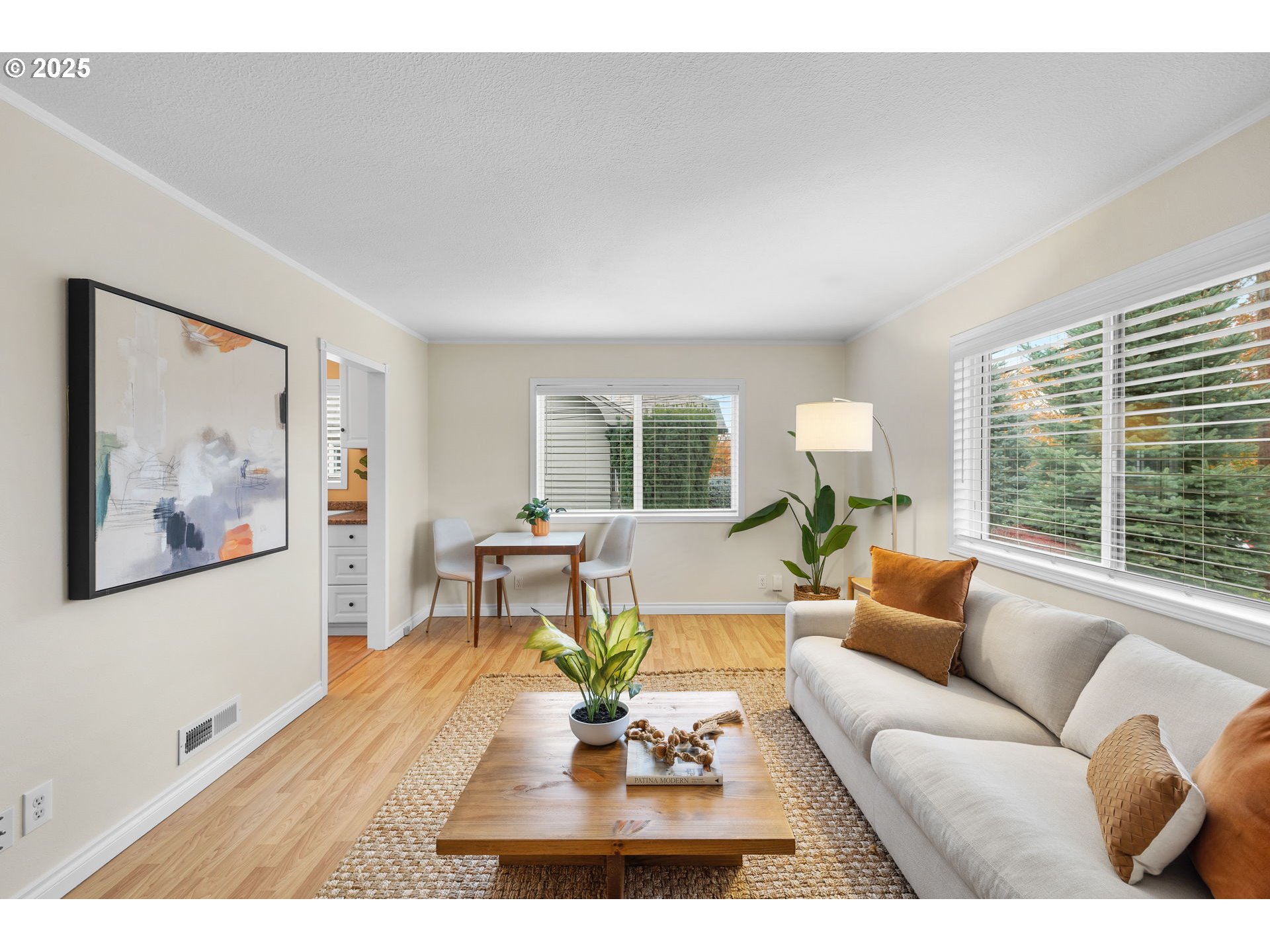 7643 Southeast Market Street Portland, OR 97215 - Photo 3 of 34 a living room with furniture and a large window