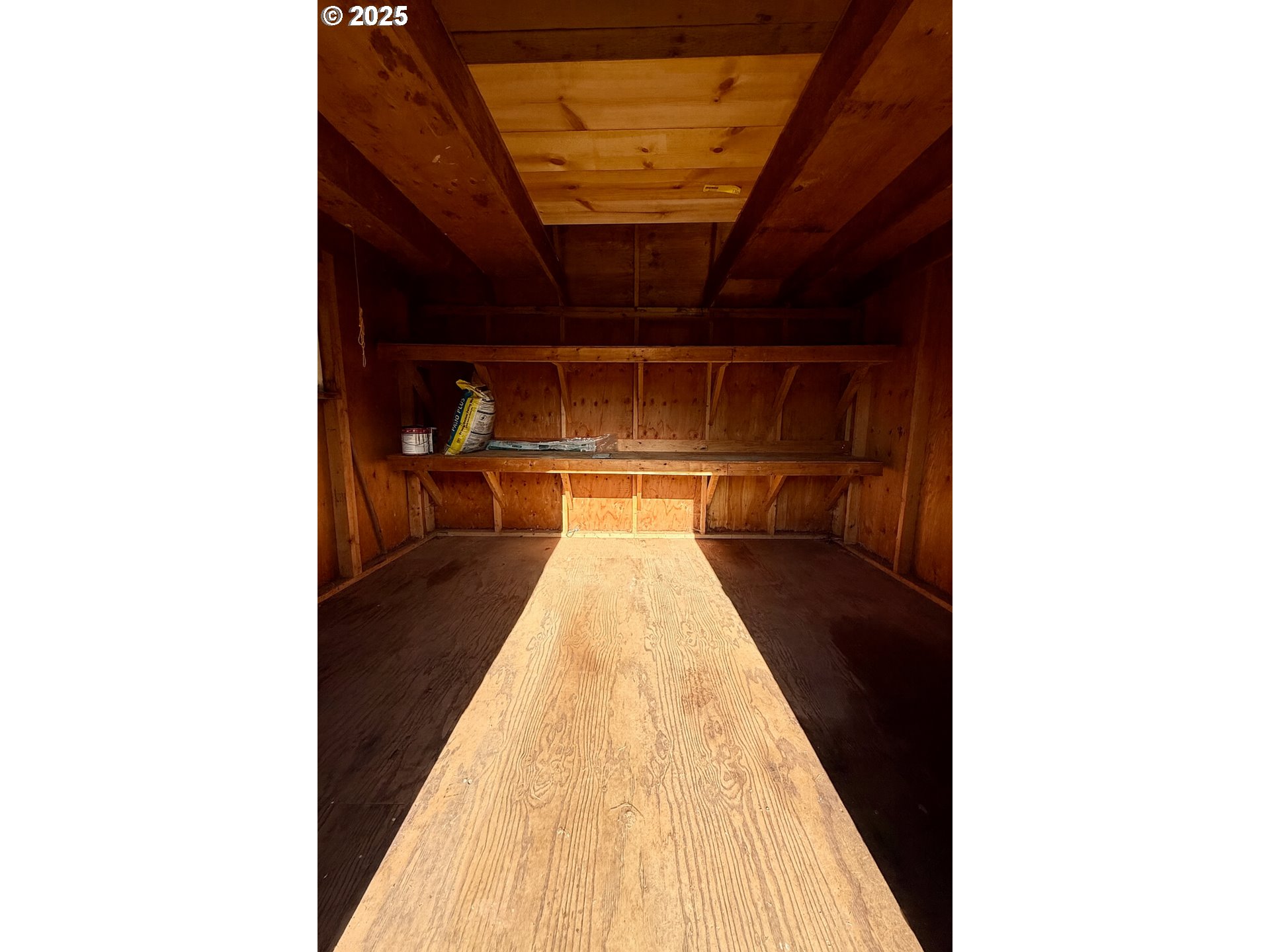 7643 Southeast Market Street Portland, OR 97215 - Photo 34 of 34 a picture of a living room with a sink and wooden floor