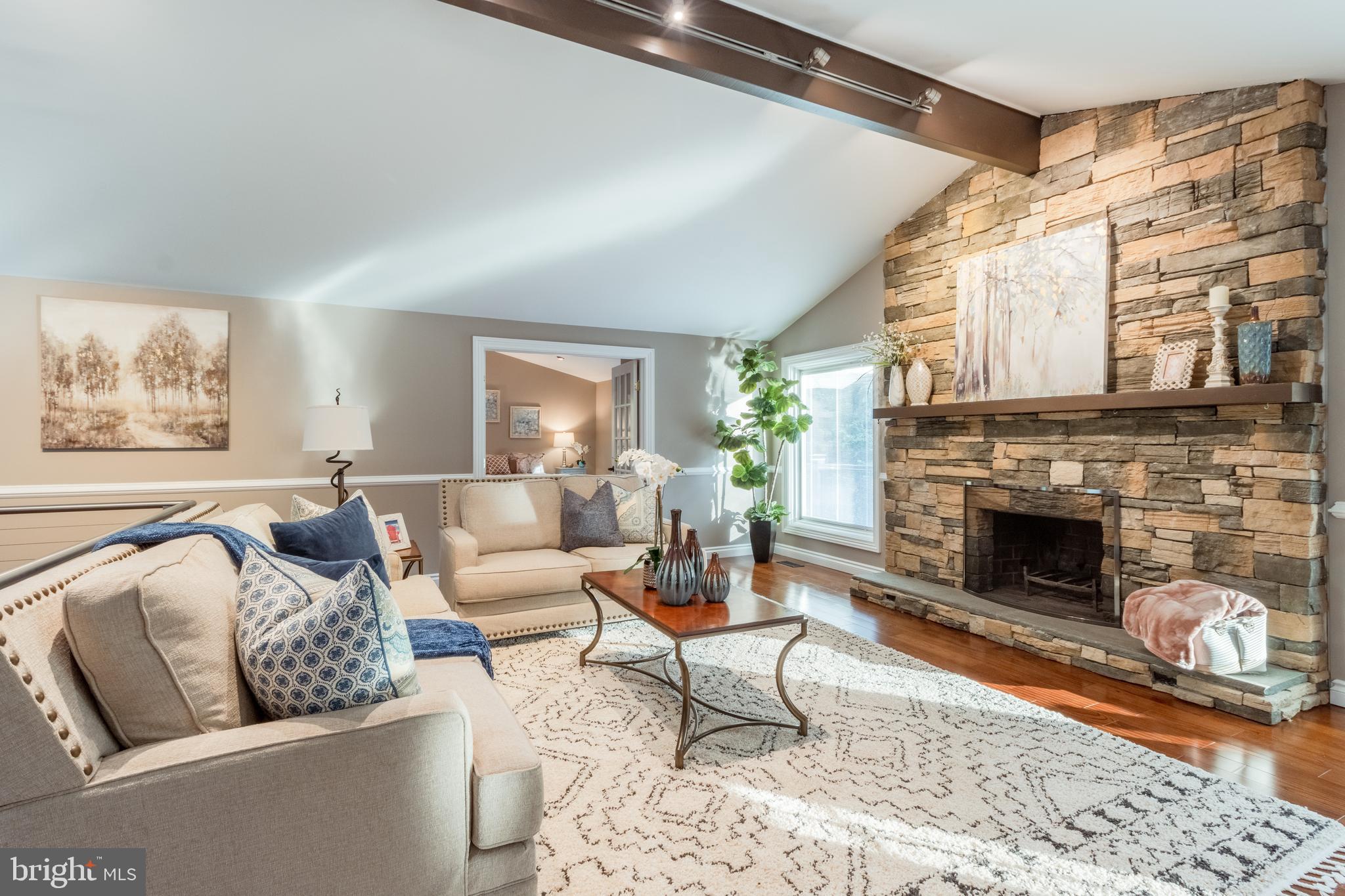 5402 Kennett Pike Wilmington, DE 19807 - Photo 14 of 81 a living room with furniture and a fireplace