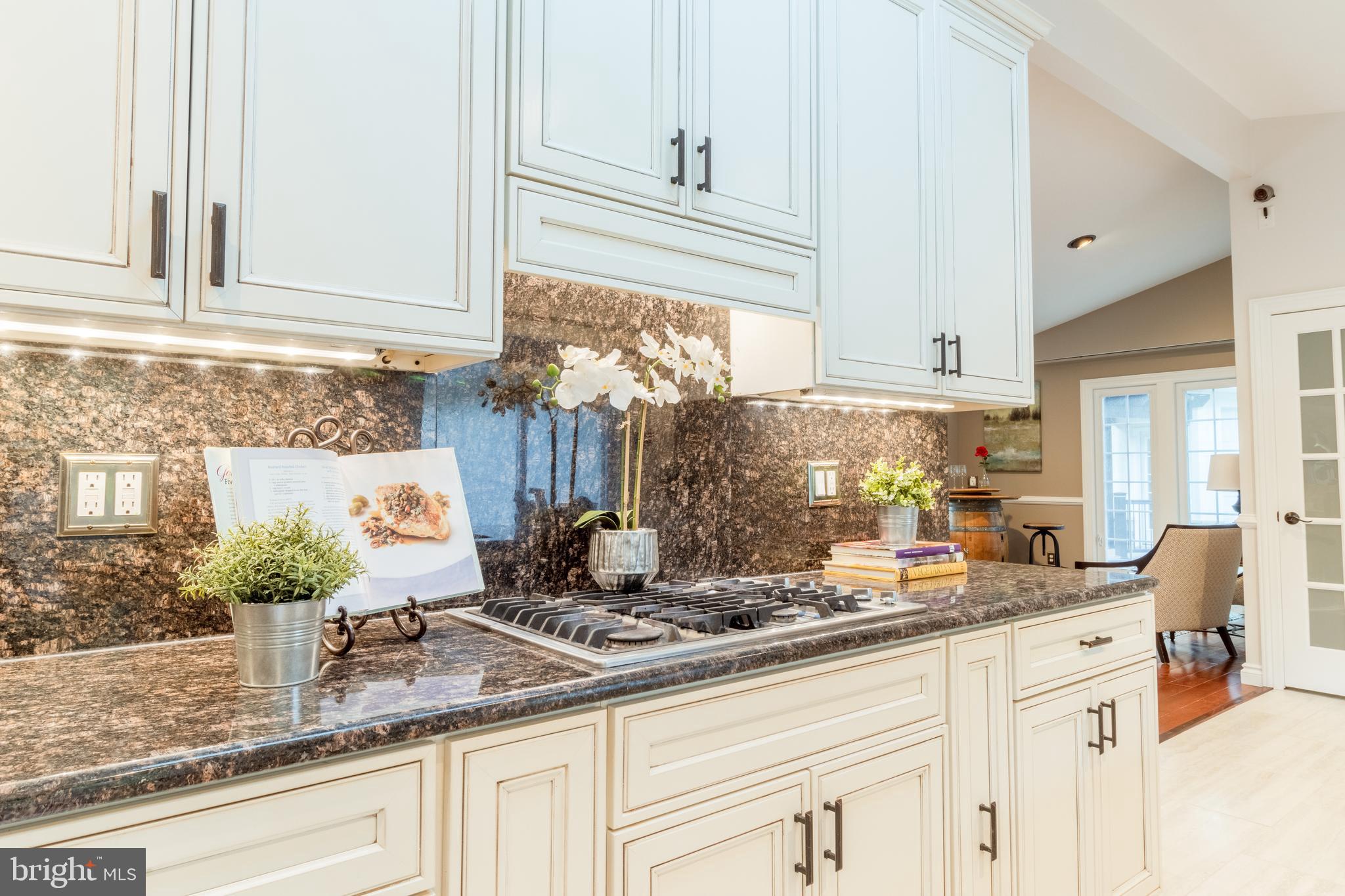 5402 Kennett Pike Wilmington, DE 19807 - Photo 26 of 81 a kitchen with granite countertop a sink and cabinets