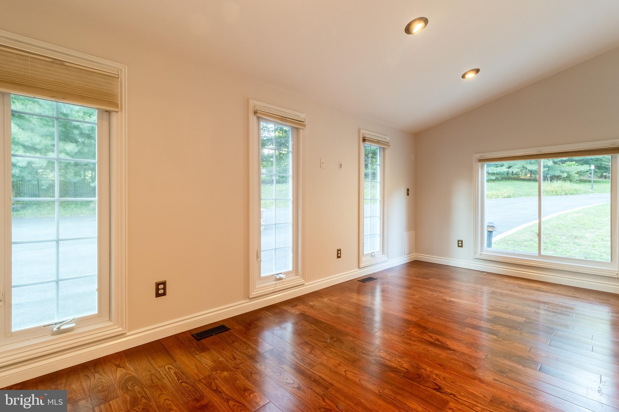 5402 Kennett Pike Wilmington, DE 19807 - Photo 46 of 81 an empty room with wooden floor and windows