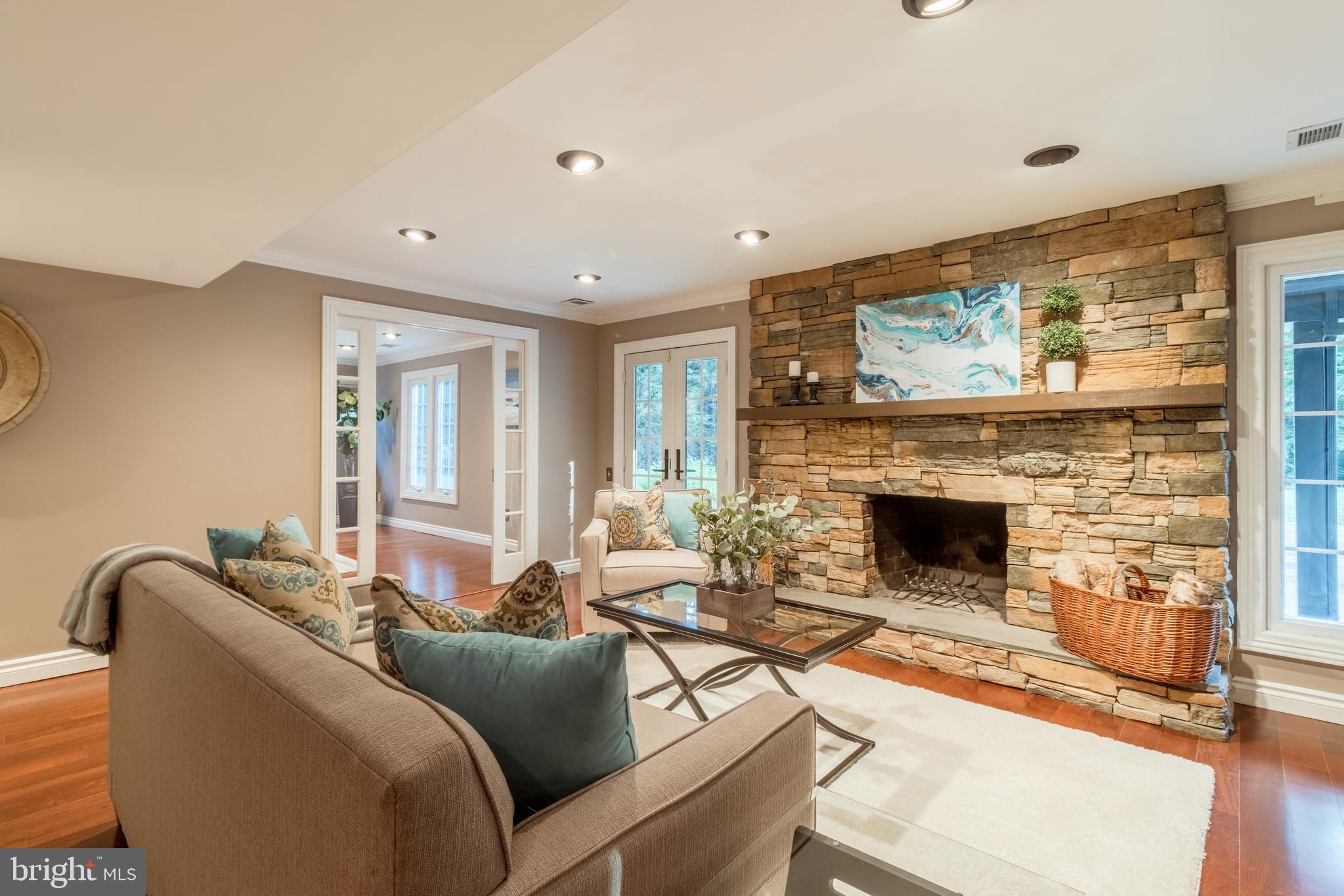 5402 Kennett Pike Wilmington, DE 19807 - Photo 52 of 81 a living room with furniture and a fireplace