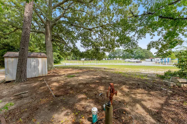 a view of a field with an outdoor space