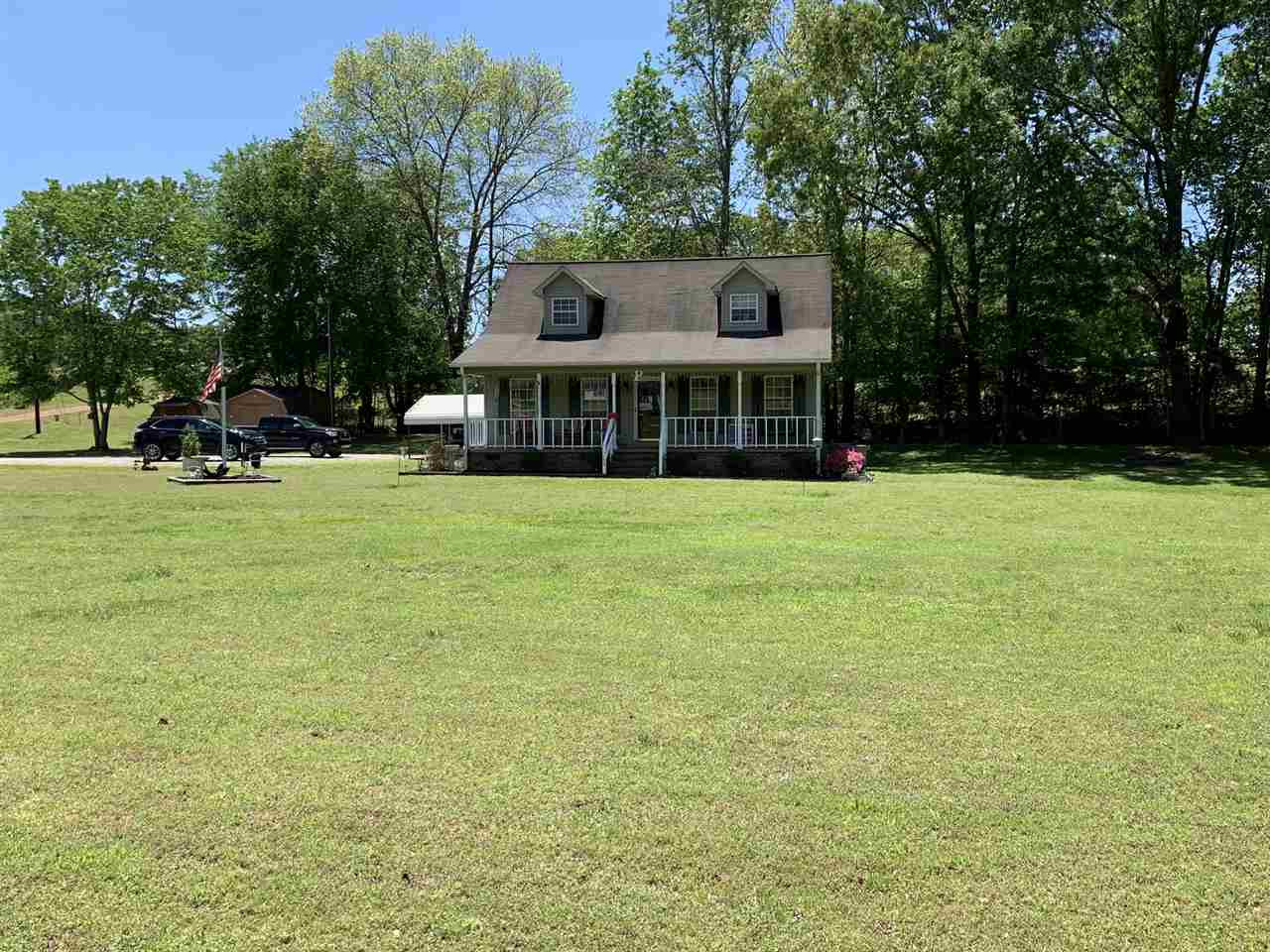 1130 Mayfield Road Finger, TN 38334 - Photo 1 of 1 a view of a house with a yard and sitting area