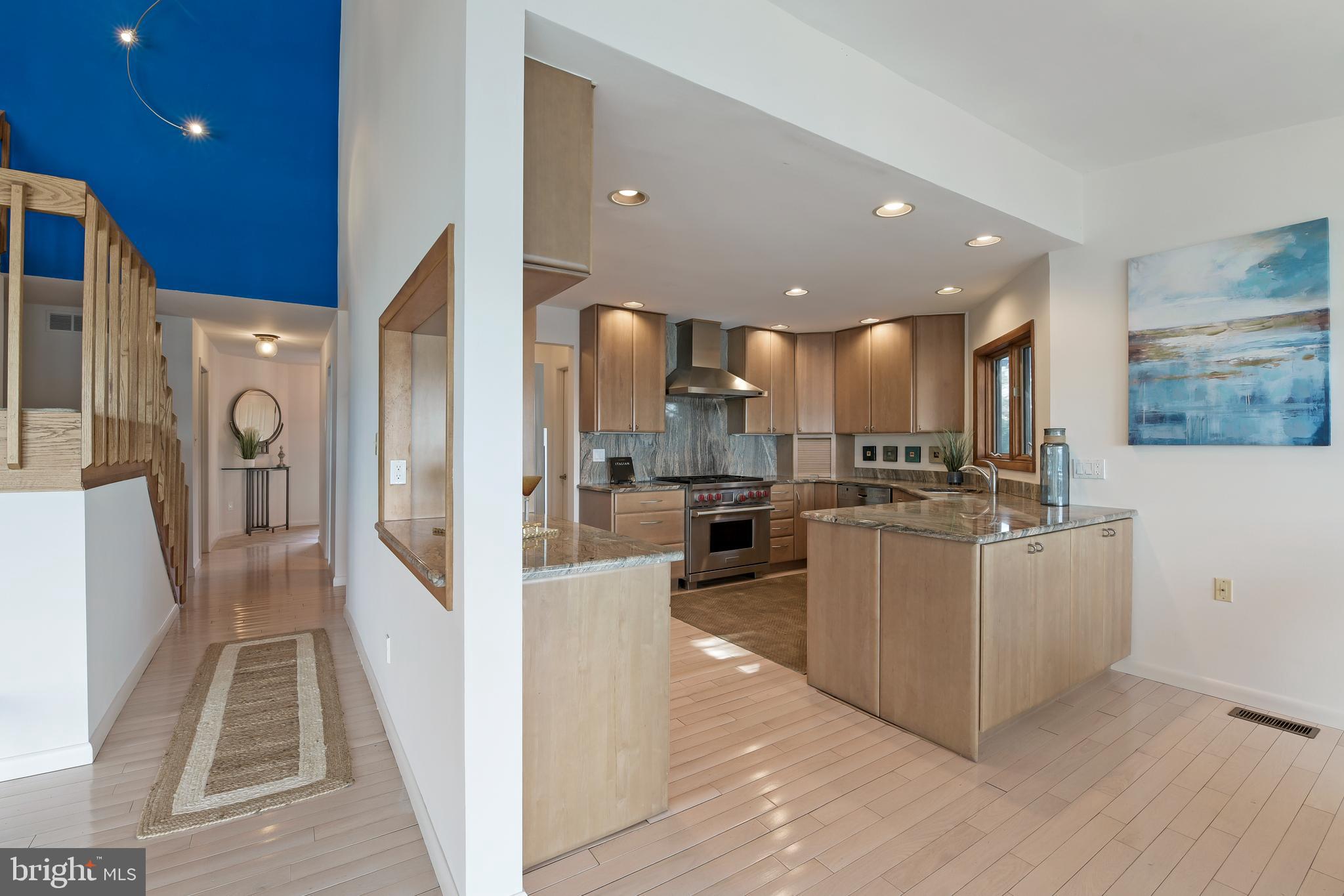 245 Long Point Road Crownsville, MD 21032 - Photo 24 of 53 a view of a kitchen with refrigerator and wooden floor