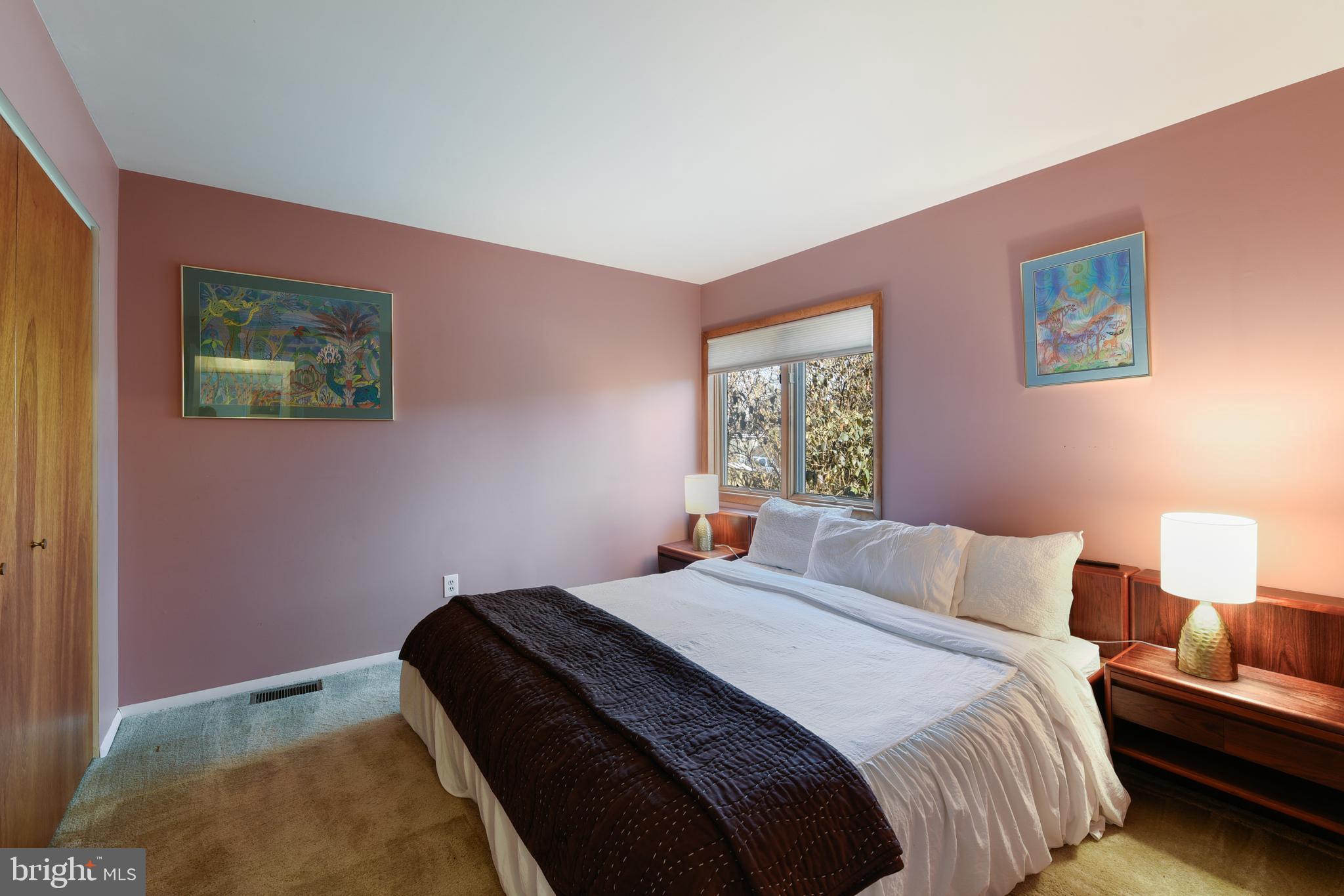 245 Long Point Road Crownsville, MD 21032 - Photo 27 of 53 a bedroom with a bed and a window