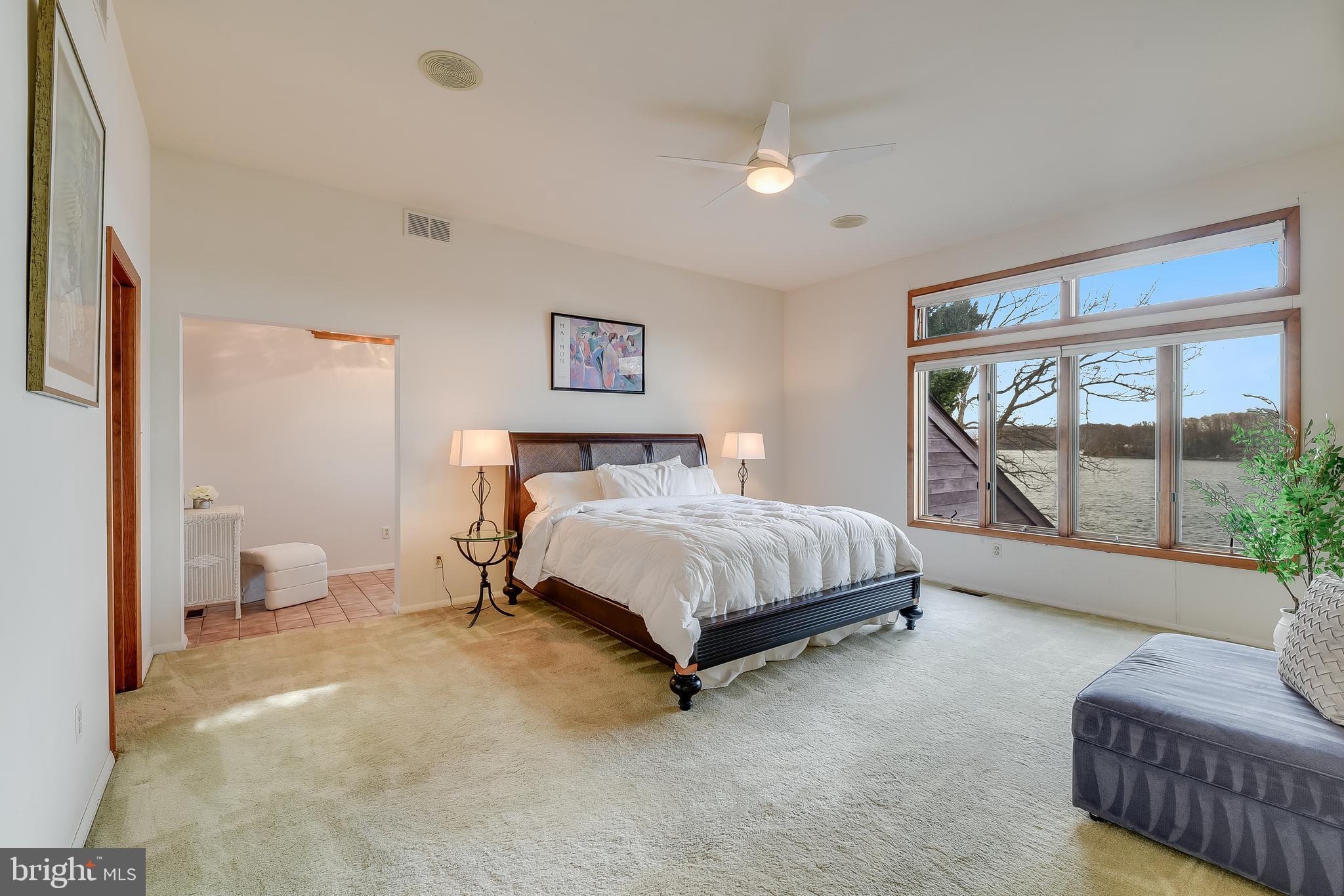 245 Long Point Road Crownsville, MD 21032 - Photo 33 of 53 a bedroom with a bed couch and a large window