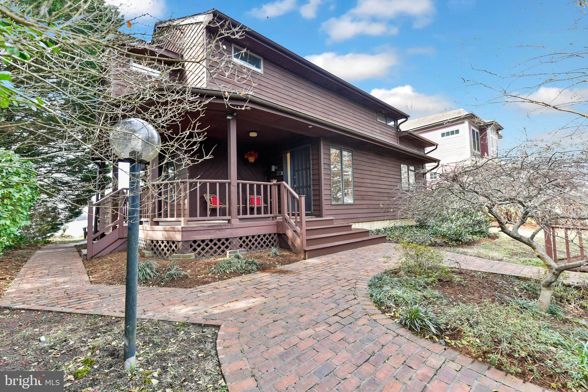 245 Long Point Road Crownsville, MD 21032 - Photo 43 of 53 a front view of a house with garden