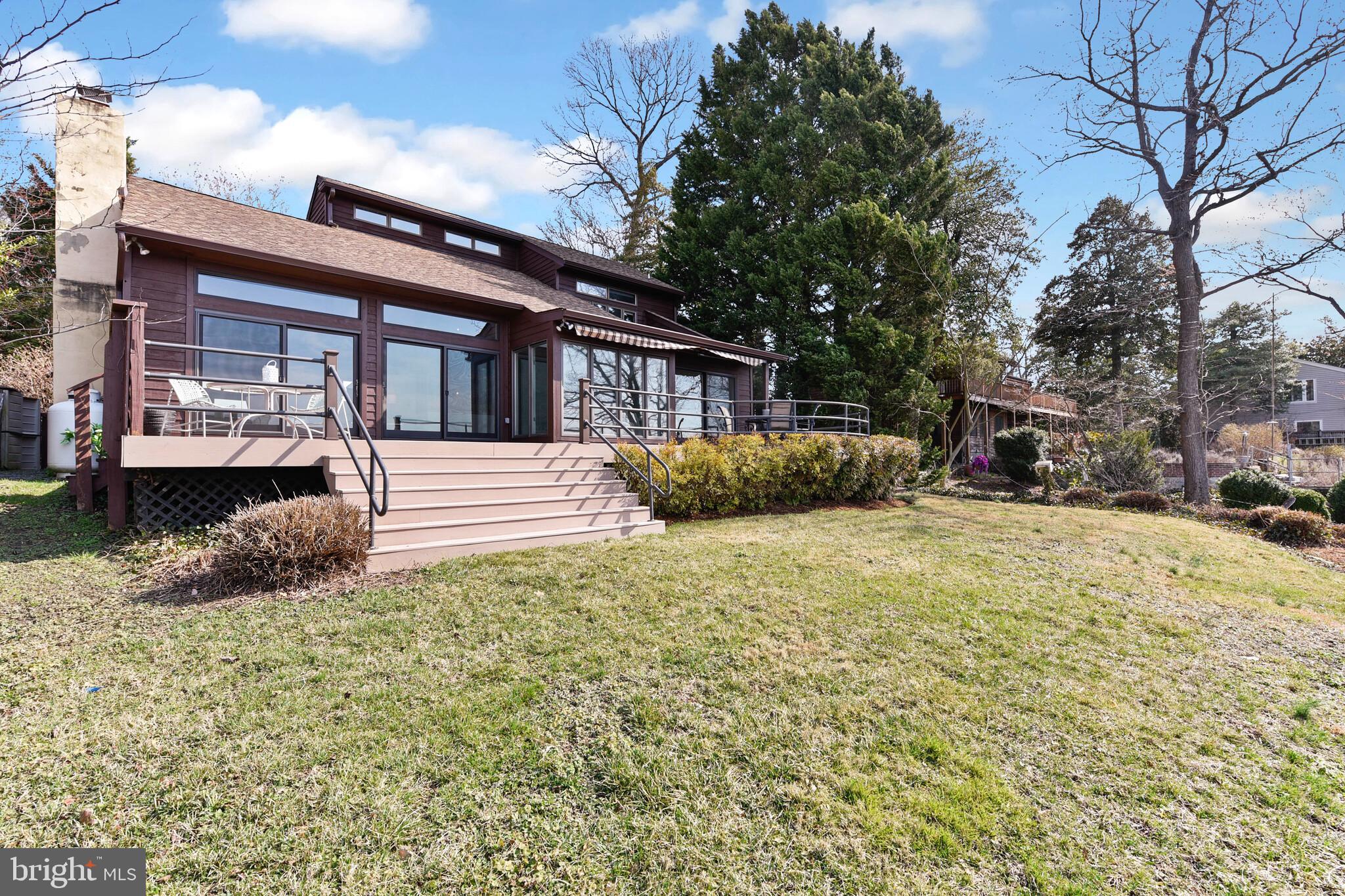 245 Long Point Road Crownsville, MD 21032 - Photo 46 of 53 a front view of a house with a yard